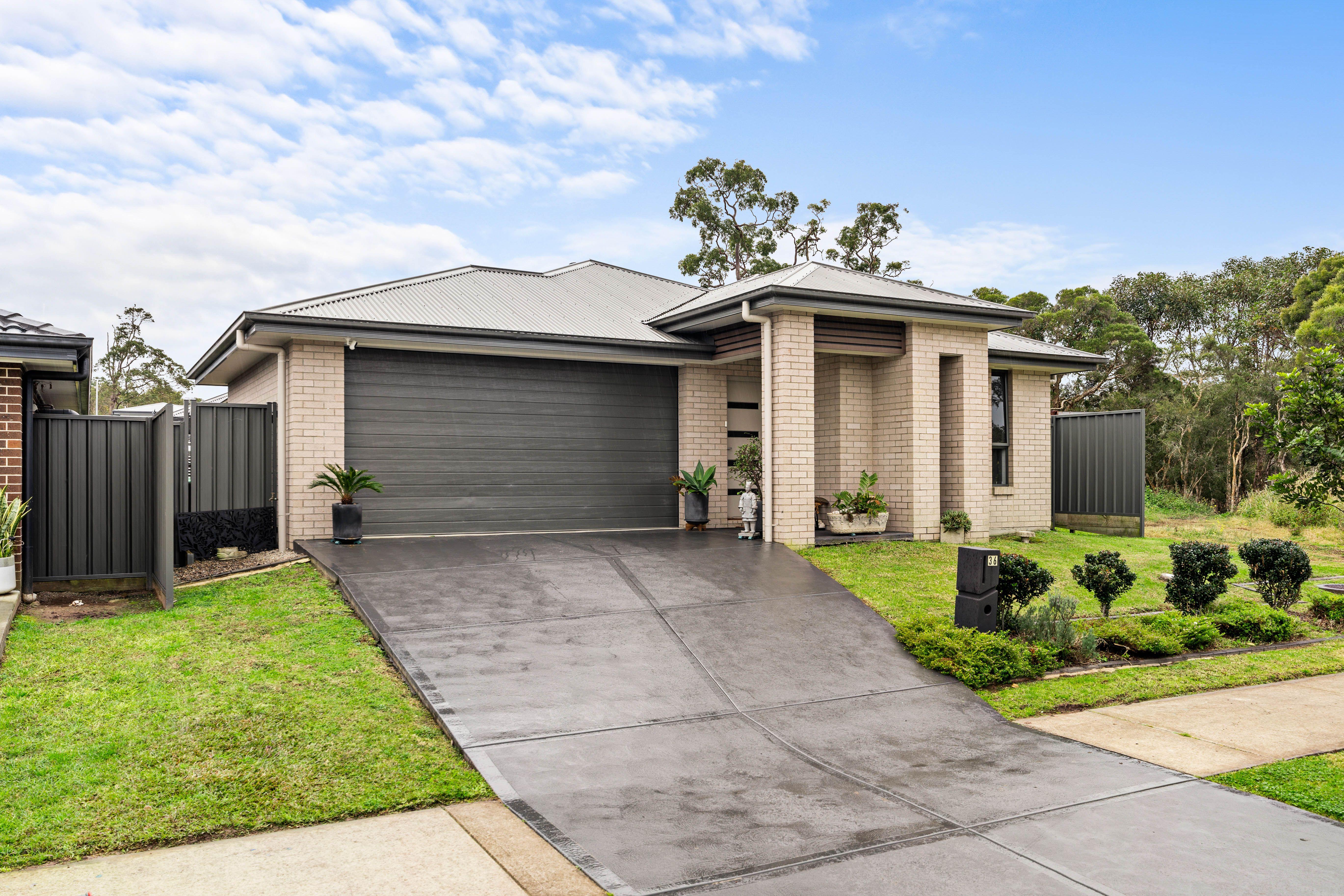 Prop-GPT: House: NSW Hamlyn Terrace, NSW 2259 Home For Sale