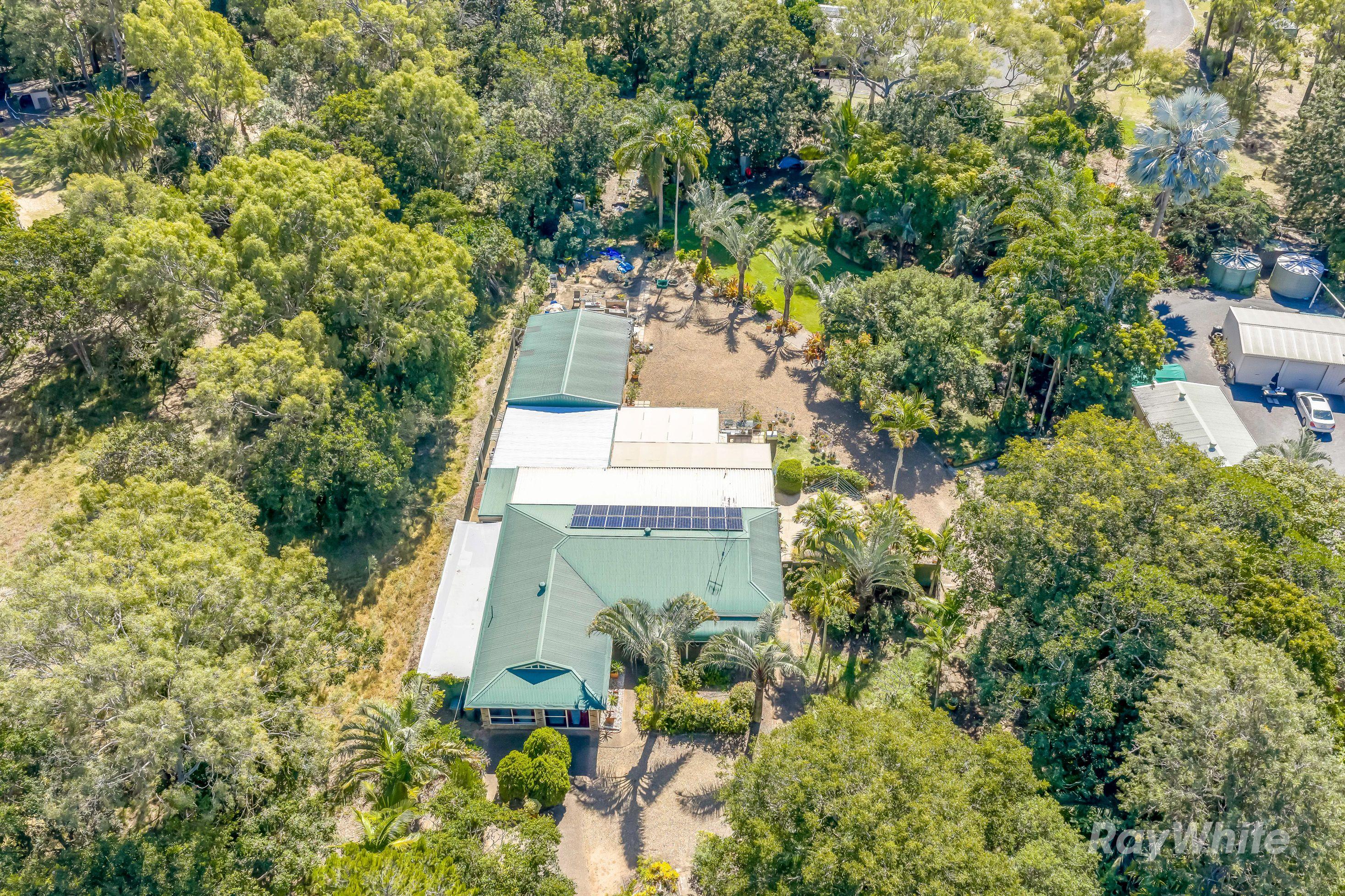 Prop-GPT: House: QLD Moore Park Beach, QLD 4670 Home For Sale