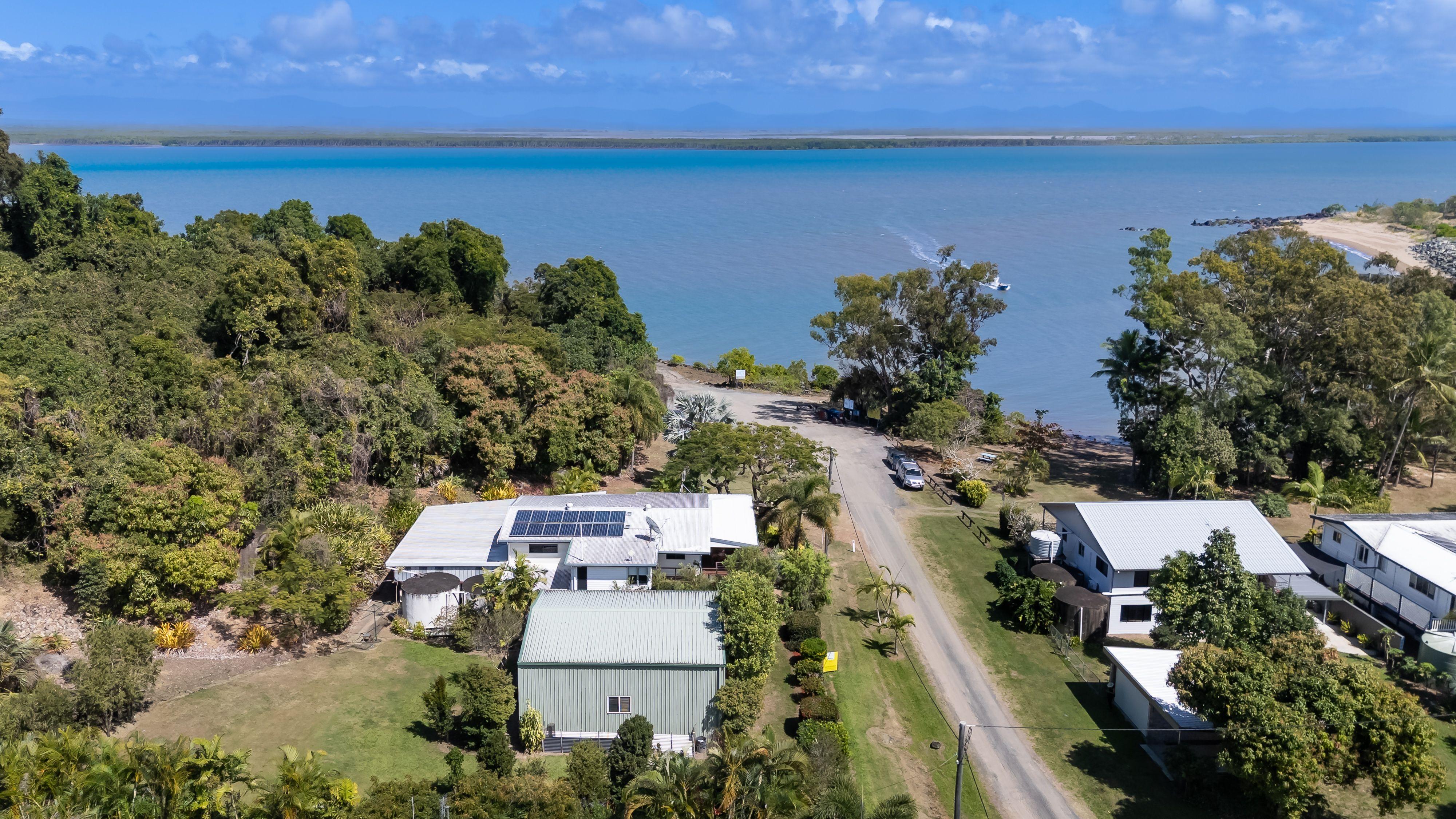 Prop-GPT: House: QLD Wilson Beach, QLD 4800 Home For Sale