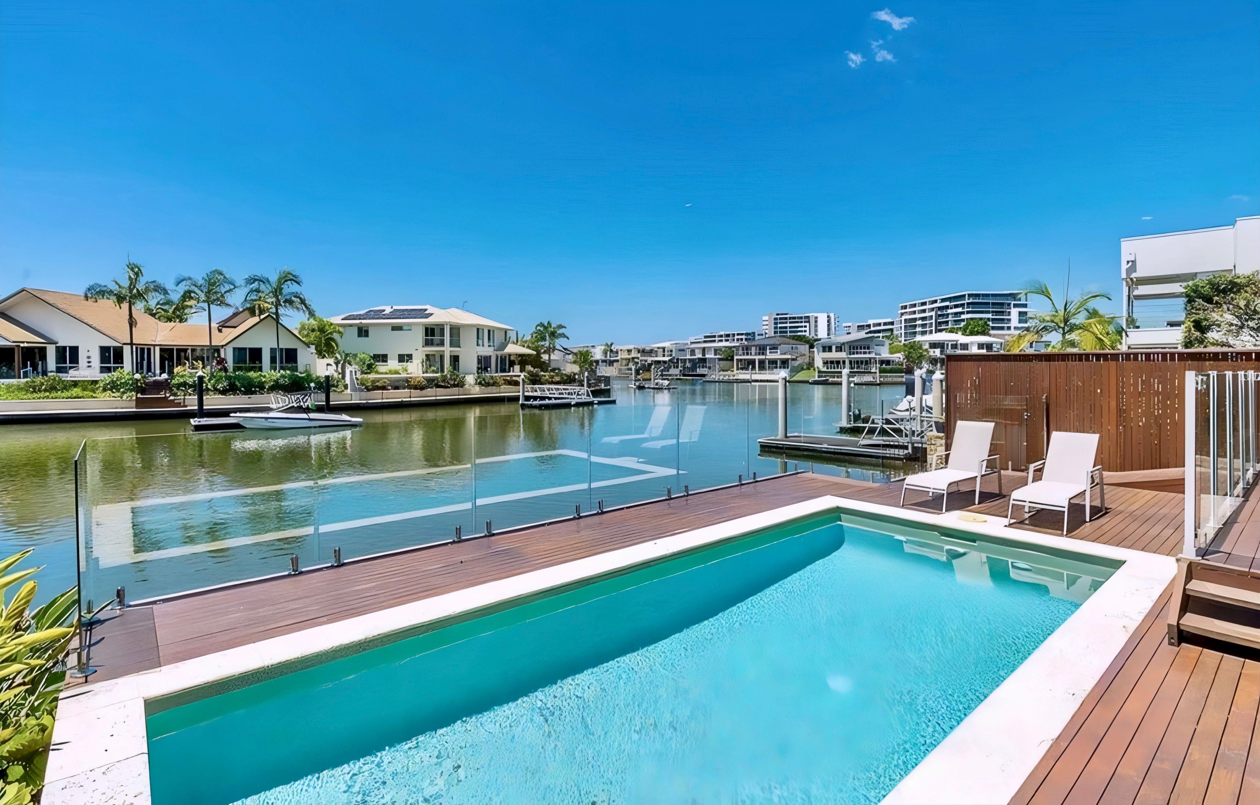Prop-GPT: House: QLD Biggera Waters, QLD 4216 Home For Sale