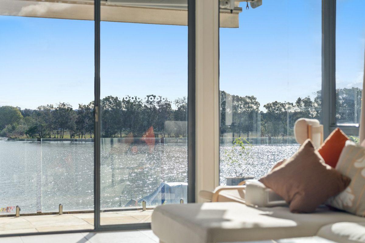 Prop-GPT: Property: QLD Clear Island Waters, QLD 4226 Queensland 4226