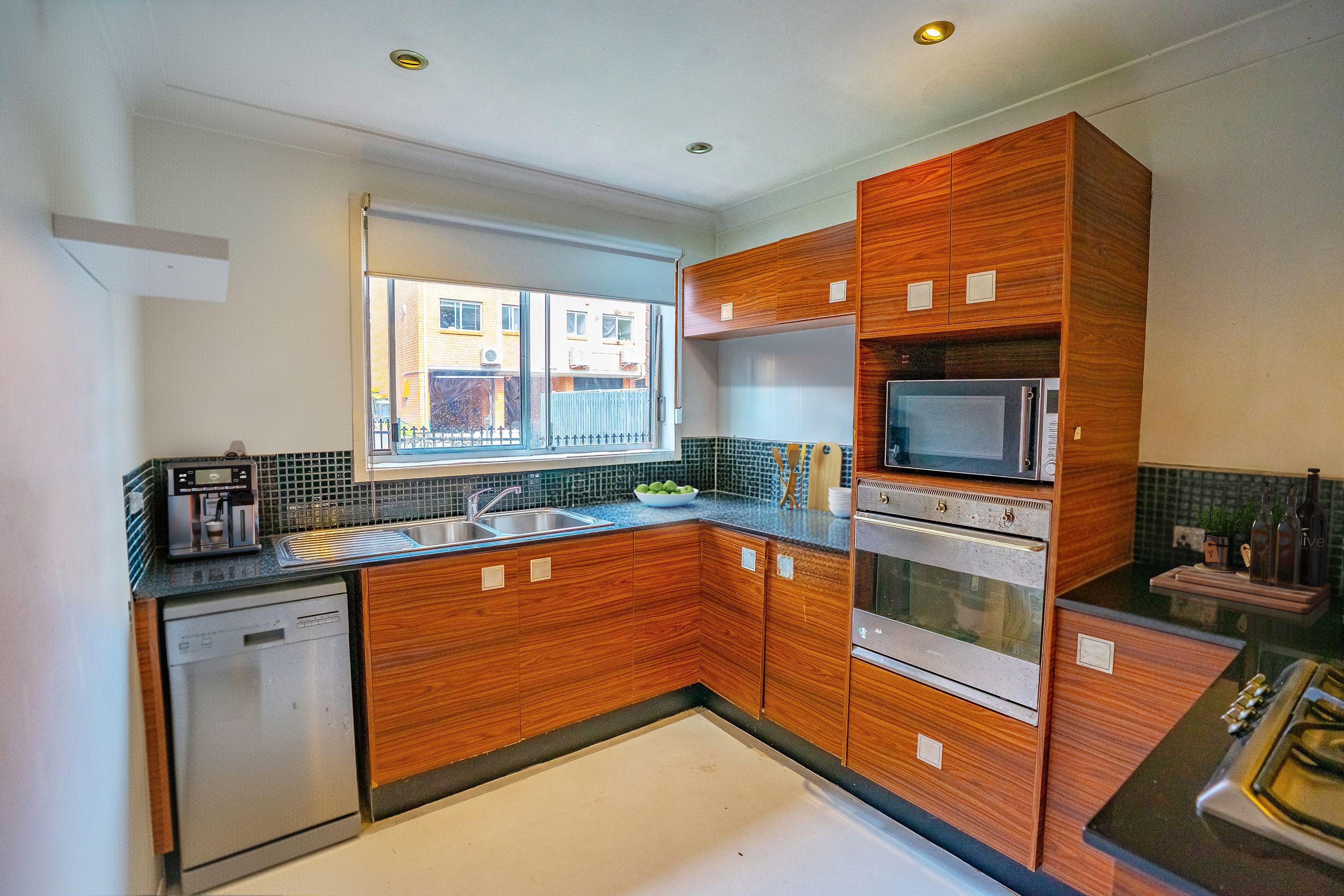 Prop-GPT: Townhouse: NSW Cooks Hill, NSW 2300 Home For Sale