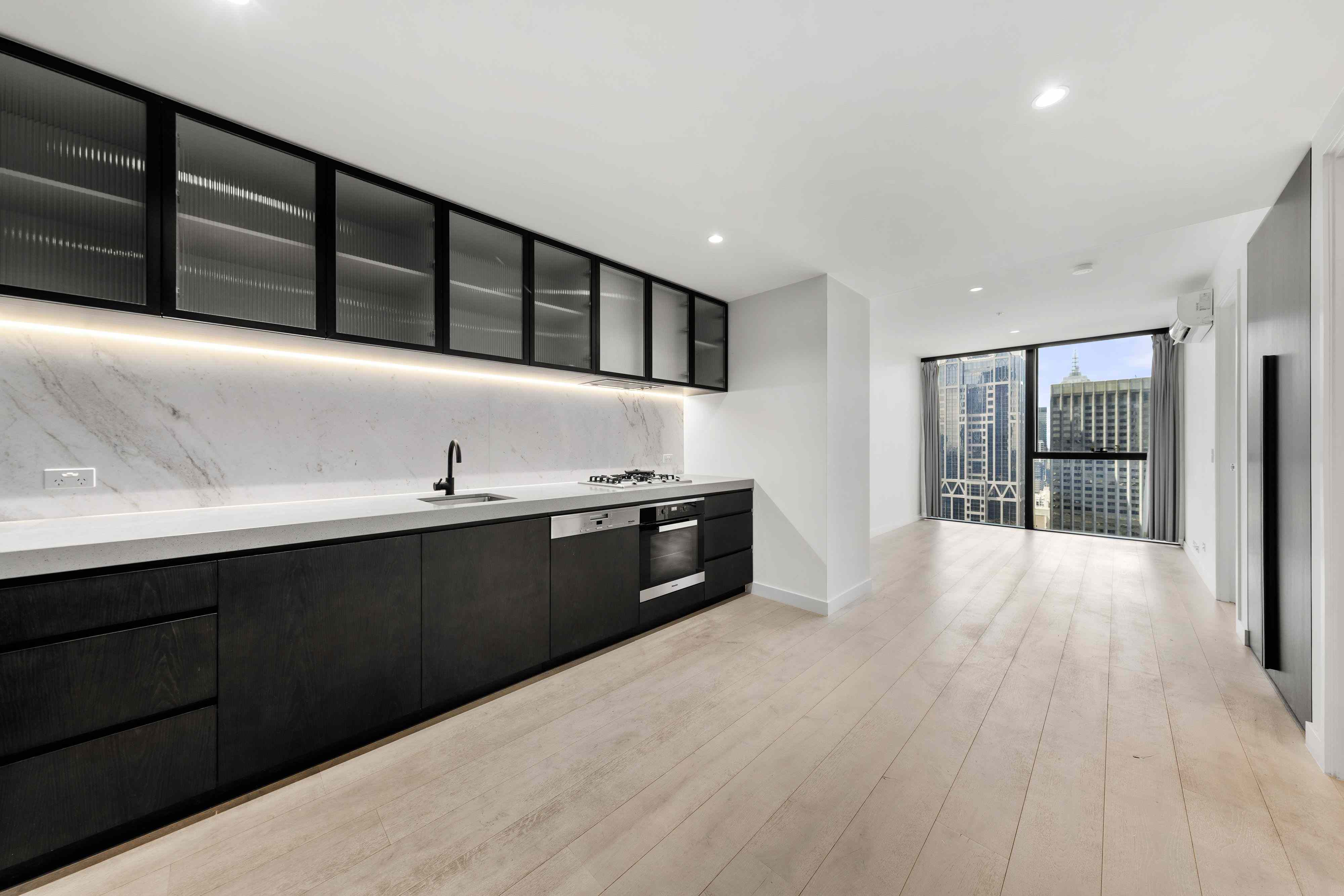 Prop-GPT: Apartment: VIC Melbourne, VIC 3000 Sophisticated City Living in the Heart of Collins Street