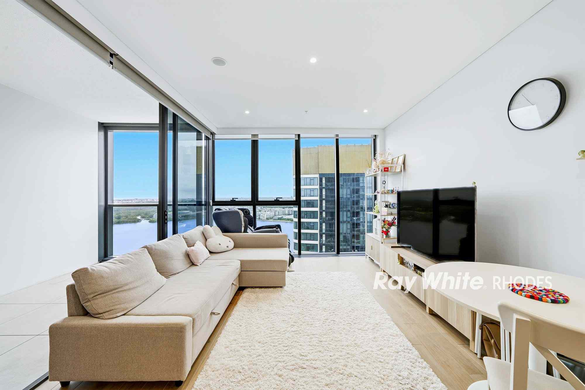 Prop-GPT: Apartment: NSW Rhodes, NSW 2138 Stylish Waterfront Living in the Heart of Rhodes