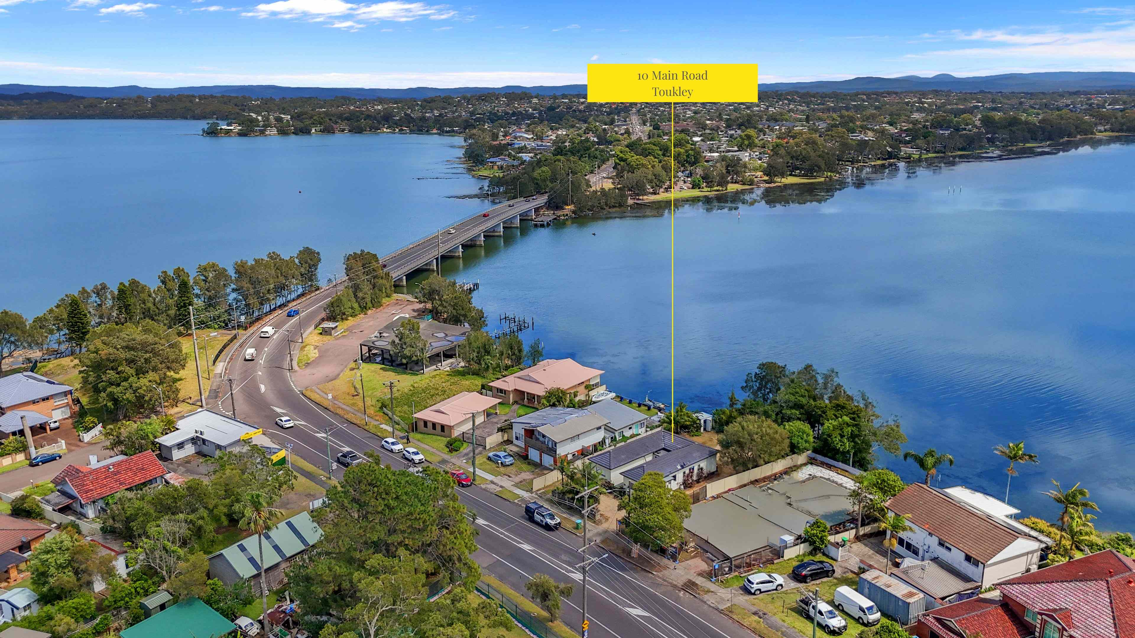 Prop-GPT: House: NSW Toukley, NSW 2263 Direct Waterfront - 3 Residential Flats