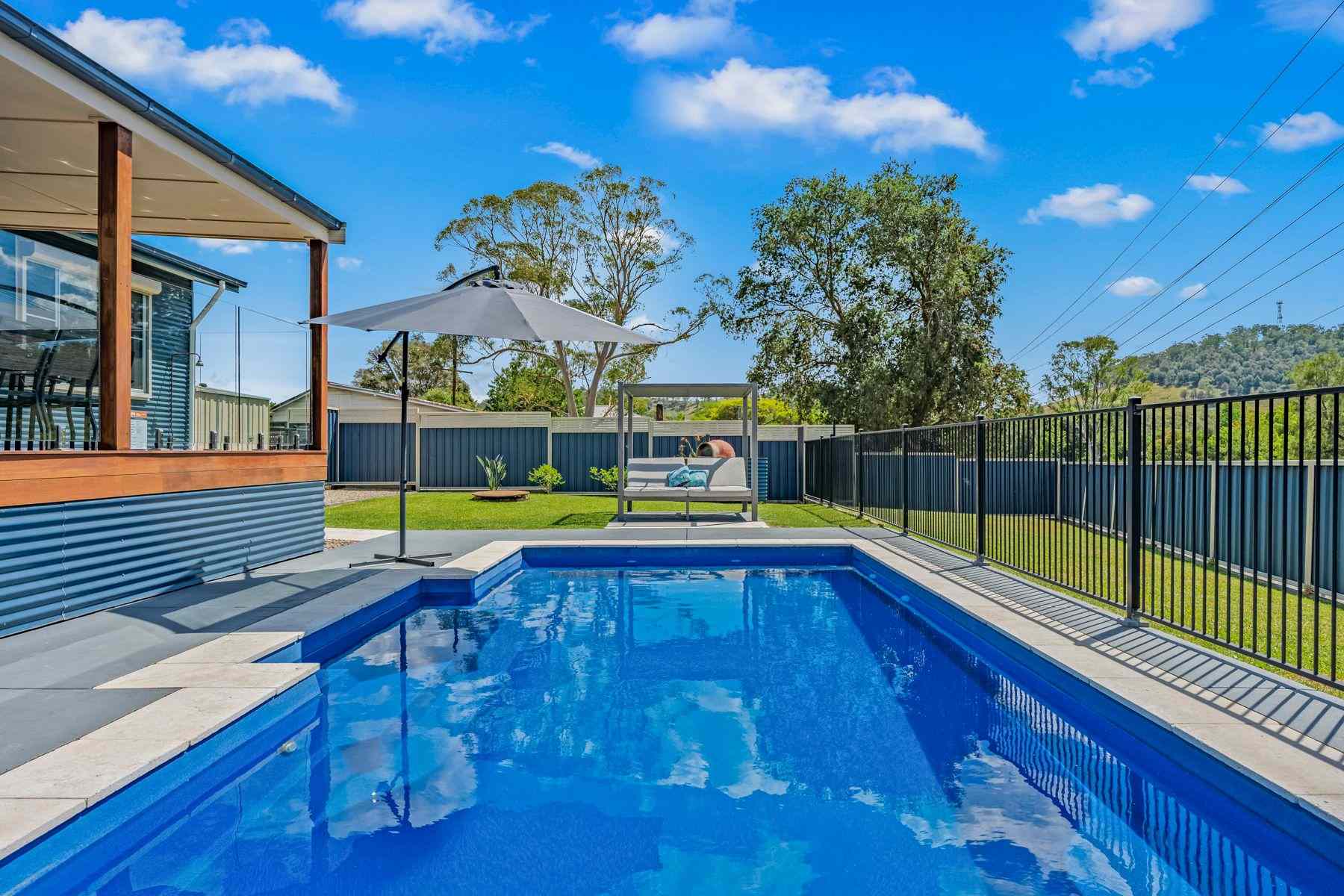 Prop-GPT: House: NSW Gloucester, NSW 2422 Move-In Ready Family Home with Pool, Shed & Stunning Mountain Views