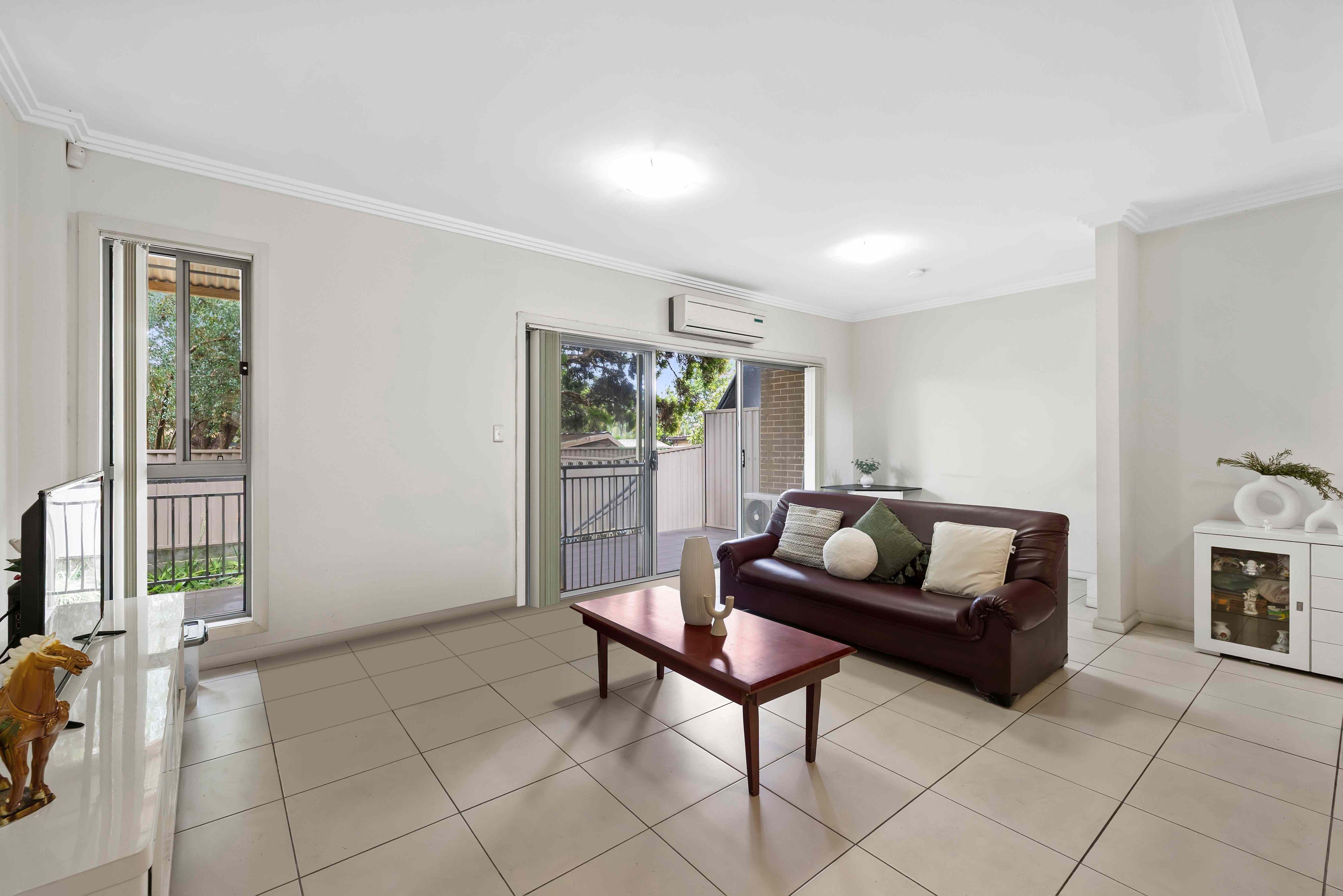 Prop-GPT: Townhouse: NSW Auburn, NSW 2144 Spacious Modern Home with Convenient Location