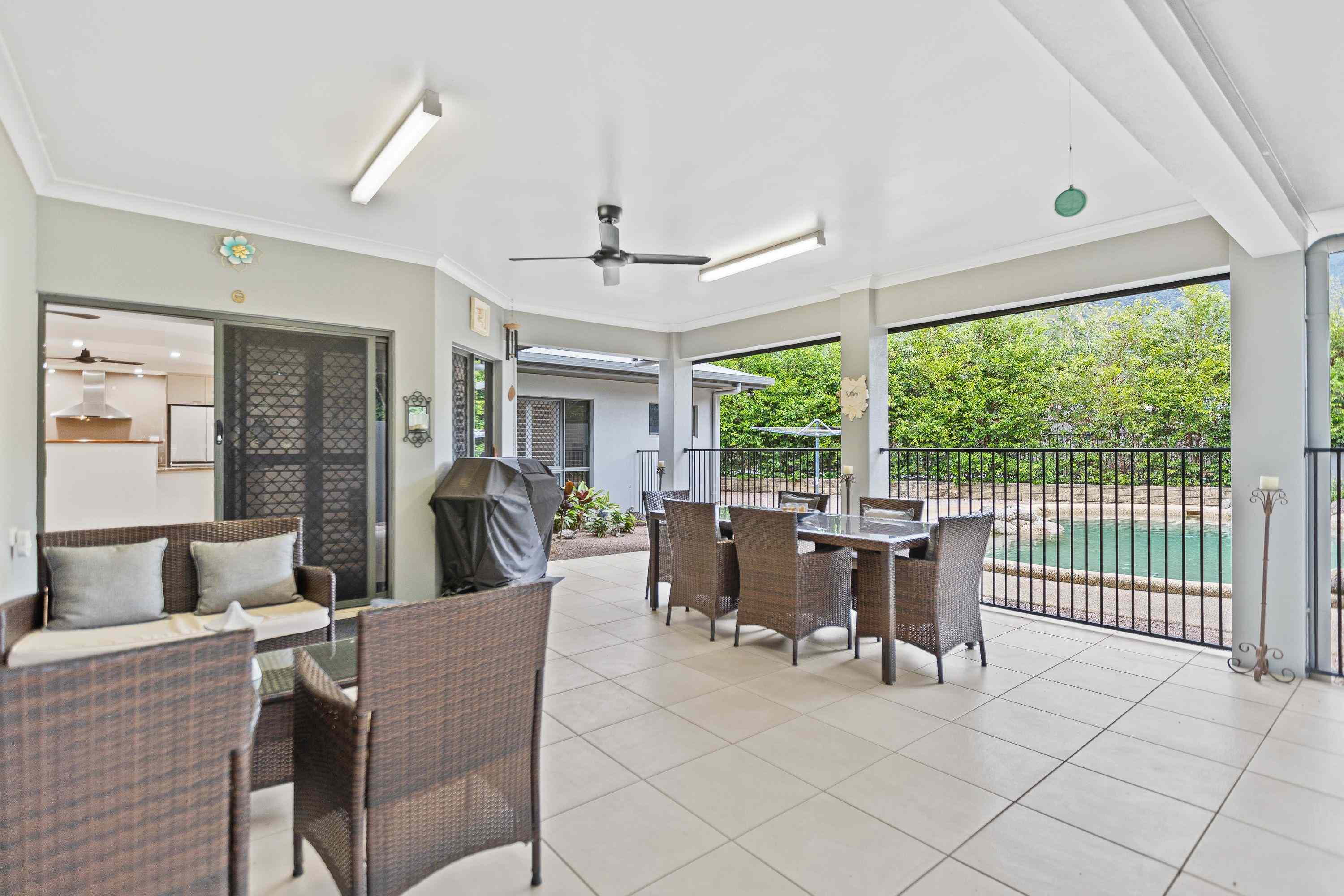 Prop-GPT: House: QLD Edmonton, QLD 4869 Hidden Treasure on 962m² - Low Maintenance - Tranquil Lifestyle with Pool & Huge Rendered Powered Workshop