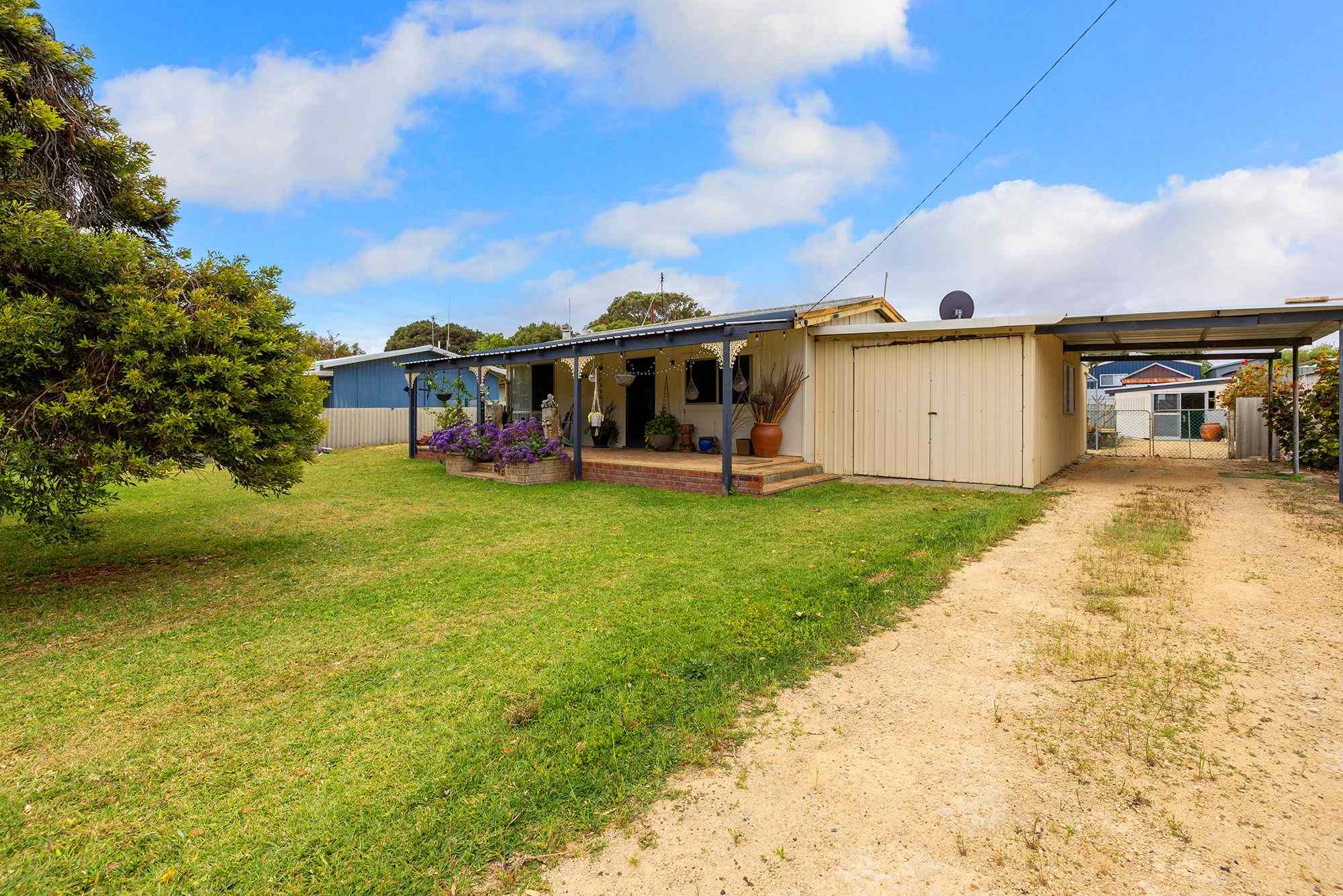 Prop-GPT: House: WA Lancelin, WA 6044 A LANCELIN ORIGINAL - NOSTALGIC COASTAL LIVING WITH ¼-ACRE POTENTIAL
