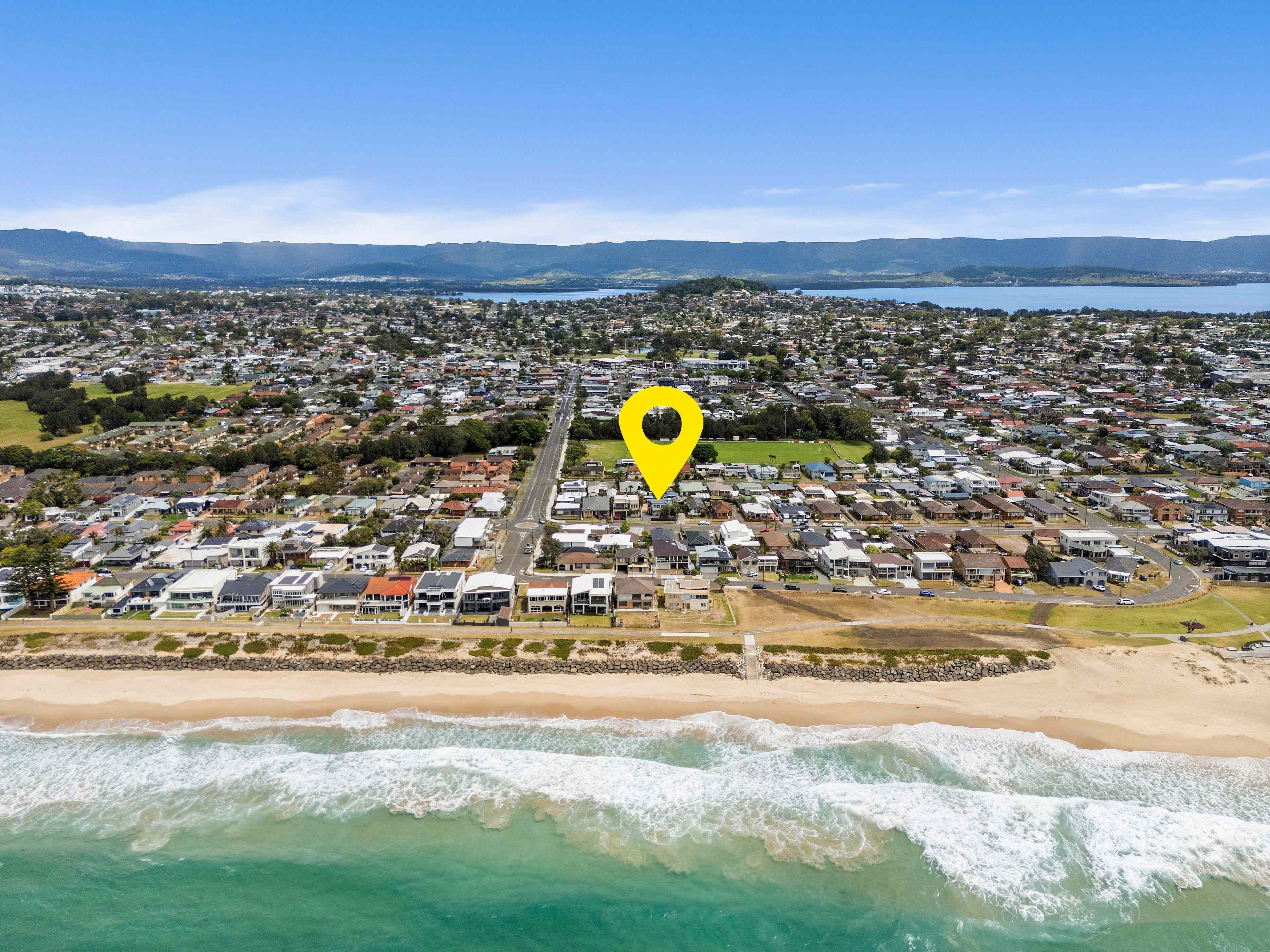 Prop-GPT: House: NSW Warilla, NSW 2528 Coastal Convenience and Versatility Just Moments from the Beach