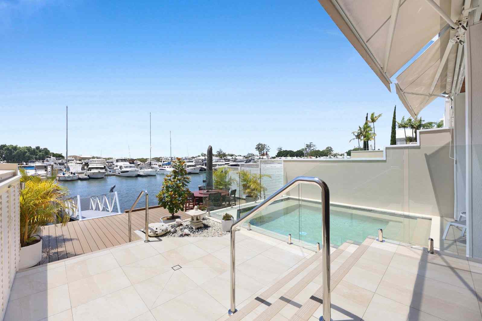 Prop-GPT: House: QLD Sanctuary Cove, QLD 4212 North-facing waterfront villa with direct outlook over Harbour One