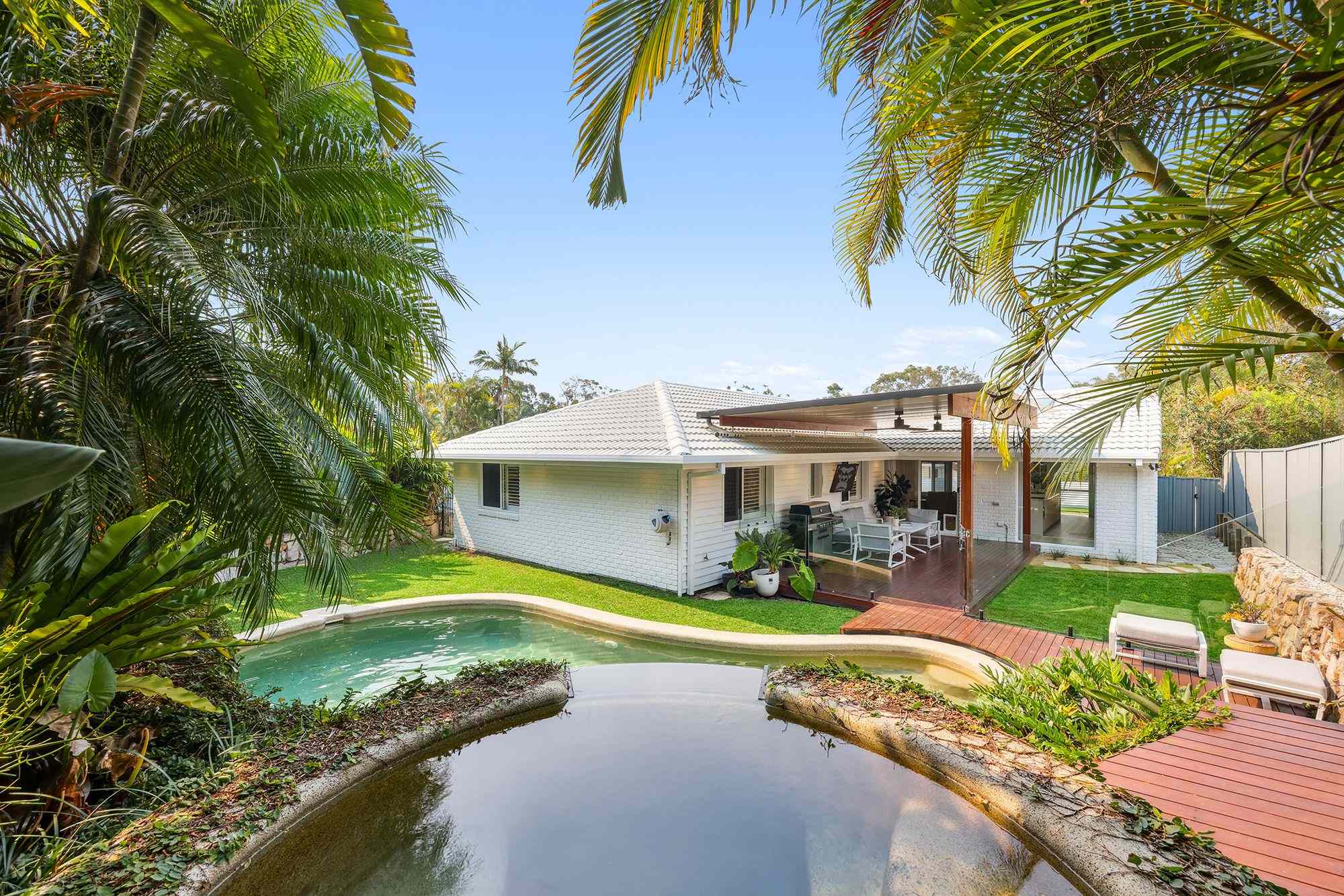 Prop-GPT: House: QLD Robina, QLD 4226 Sunlit Entertainer with Poolside Bliss & Perfect Central Location