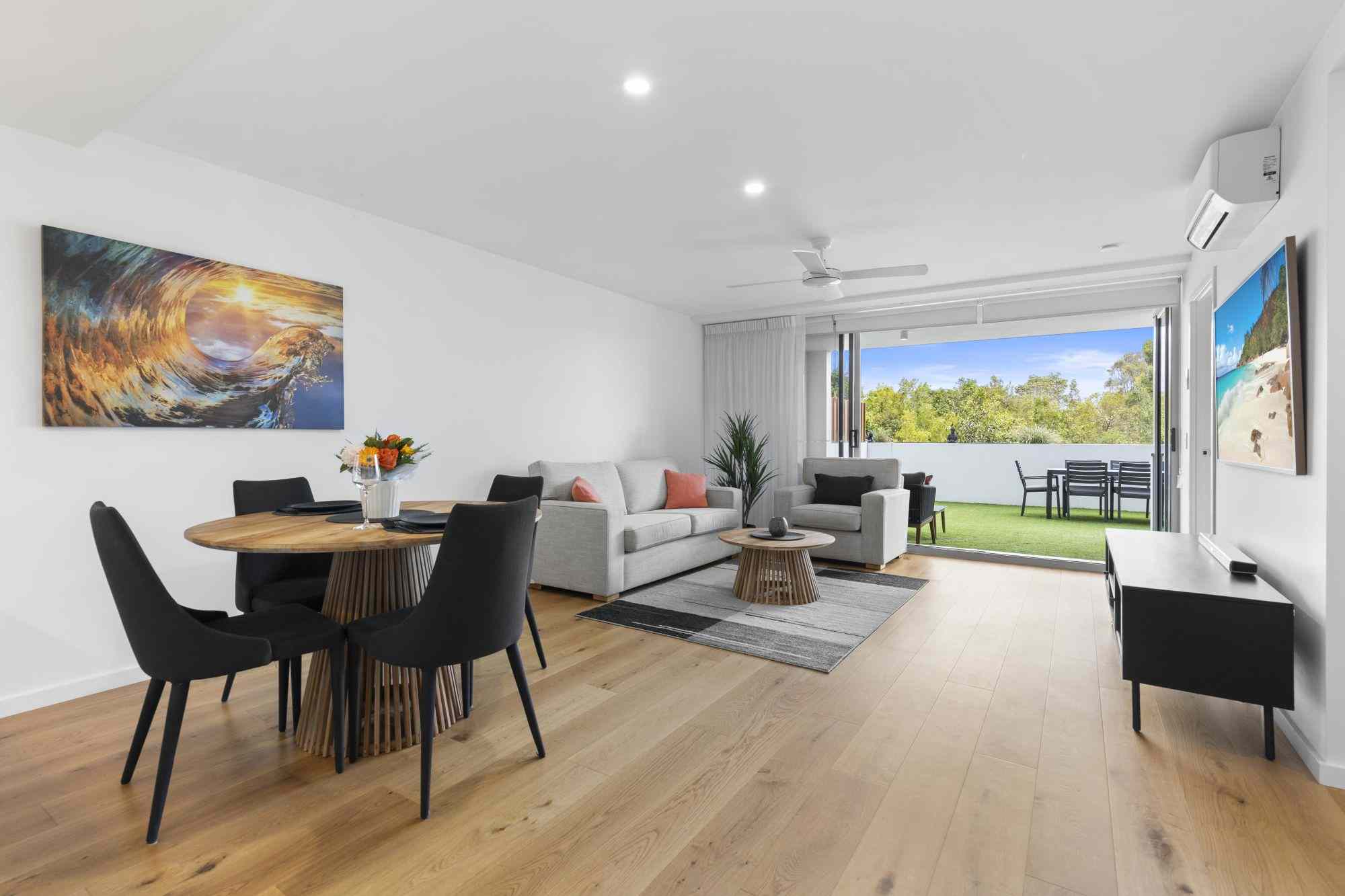 Prop-GPT: Apartment: QLD Robina, QLD 4226 MODERN GROUND FLOOR APARTMENT WITH EXPANSIVE OUTDOOR AREA AND SERENE NATURE VIEWS