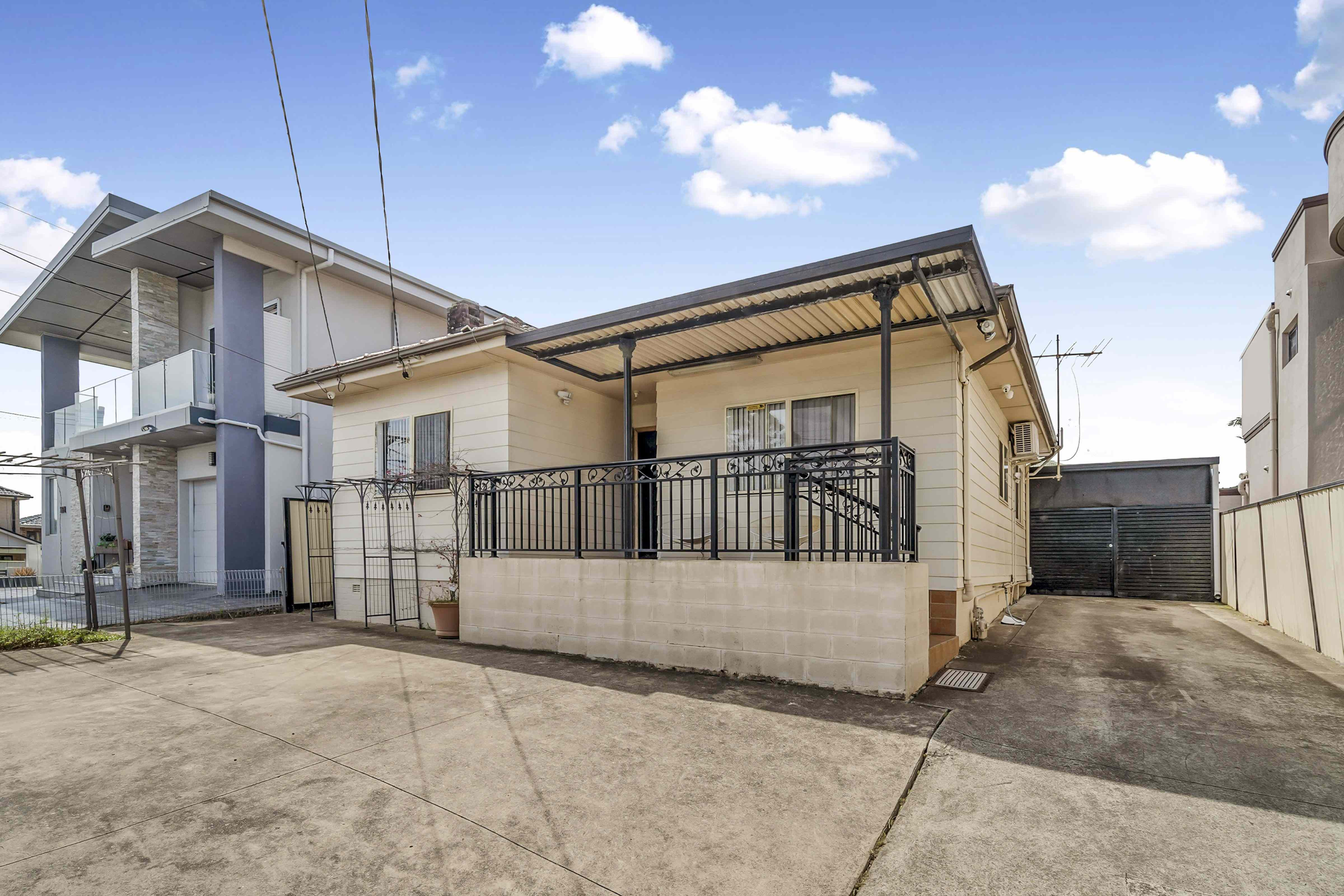 Prop-GPT: House: NSW Greenacre, NSW 2190 Spacious Family Home in a Prime Location - High Side of the Street