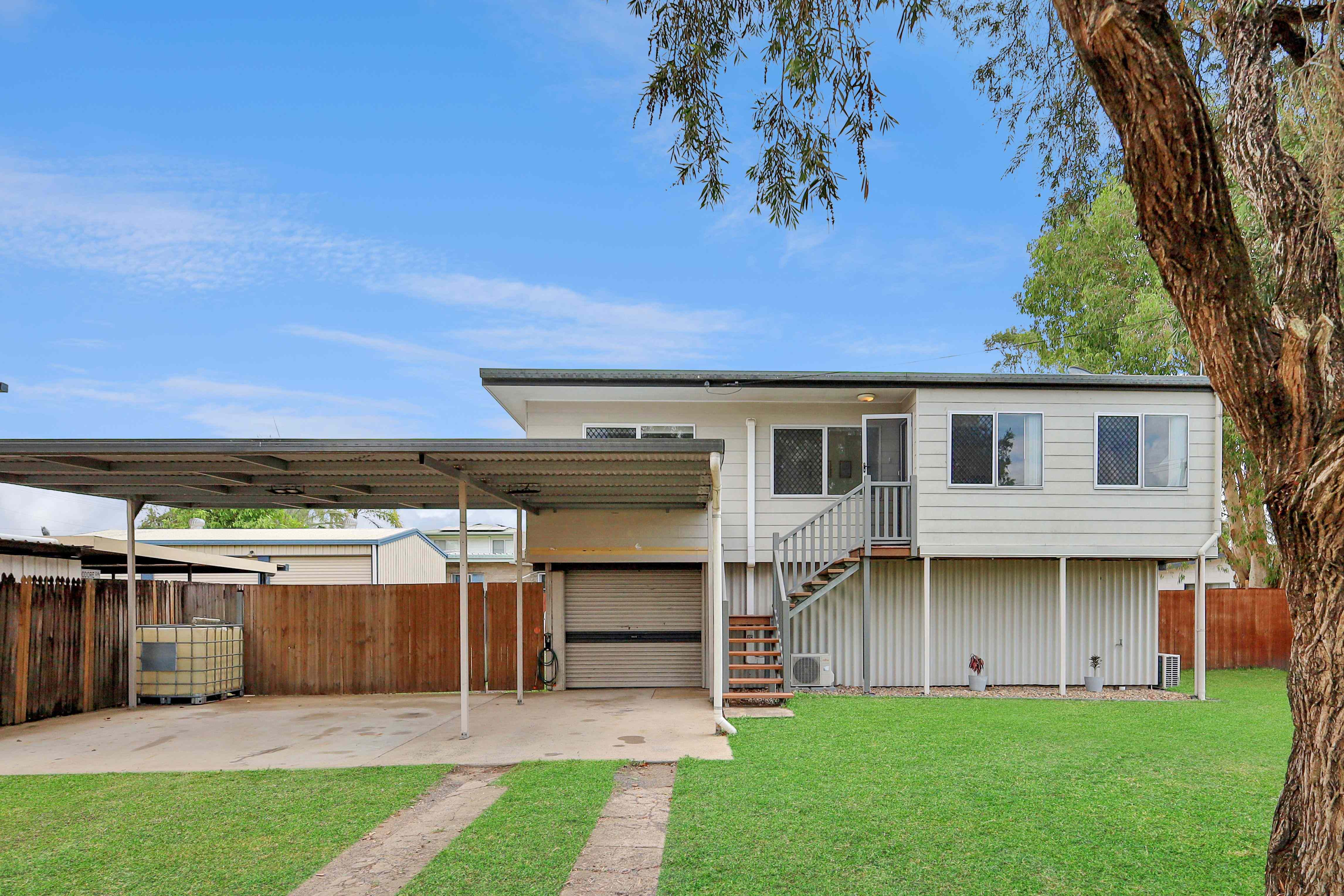 Prop-GPT: House: QLD Walkerston, QLD 4751 A Place to Call Home - Charm, Comfort & Convenience in Walkerston