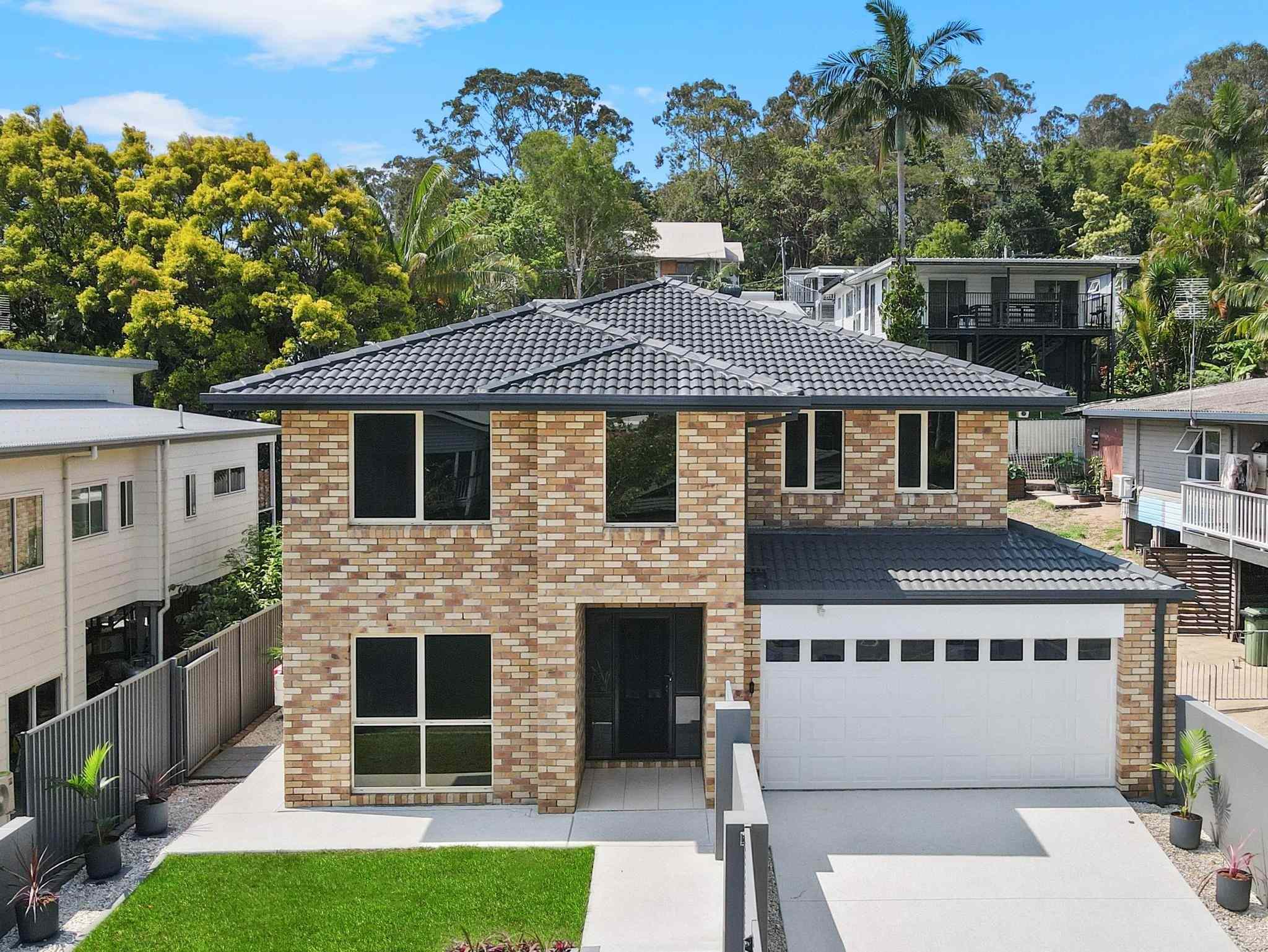 Prop-GPT: House: QLD Burleigh Heads, QLD 4220 Luxury Family Retreat in the Heart of the Gold Coast - Embrace the Burleigh Lifestyle