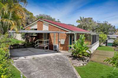Leafy Split-Level Sanctuary in Quiet Battle-axe on North-Facing Block: NSW Wyoming, NSW 2250 House | Prop-GPT the AI-Powered Property Portal