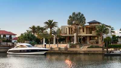 Sculptural Statement of Waterfront Sophistication and Serenity: QLD Biggera Waters, QLD 4216 House | Prop-GPT the AI-Powered Property Portal