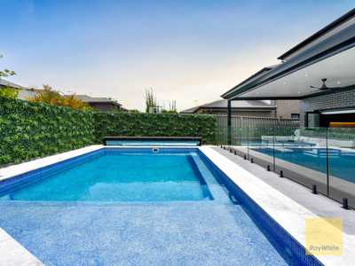 Luxurious Family Living with Poolside Entertaining in the Heart of Denham Court: NSW Denham Court, NSW 2565 House | Prop-GPT the AI-Powered Property Portal