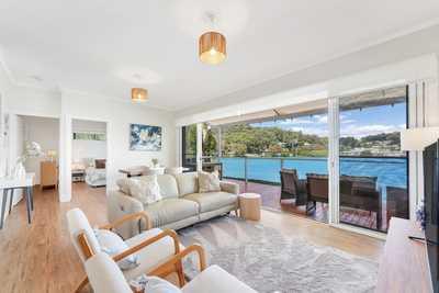 Coastal Charm with Stunning Bay Views - The Ultimate Escape: NSW Killcare, NSW 2257 House | Prop-GPT the AI-Powered Property Portal