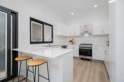 A STRIKING, FULLY RENOVATED SEASIDE COTTAGE: NSW Stockton, NSW 2295 House | Prop-GPT the AI-Powered Property Portal