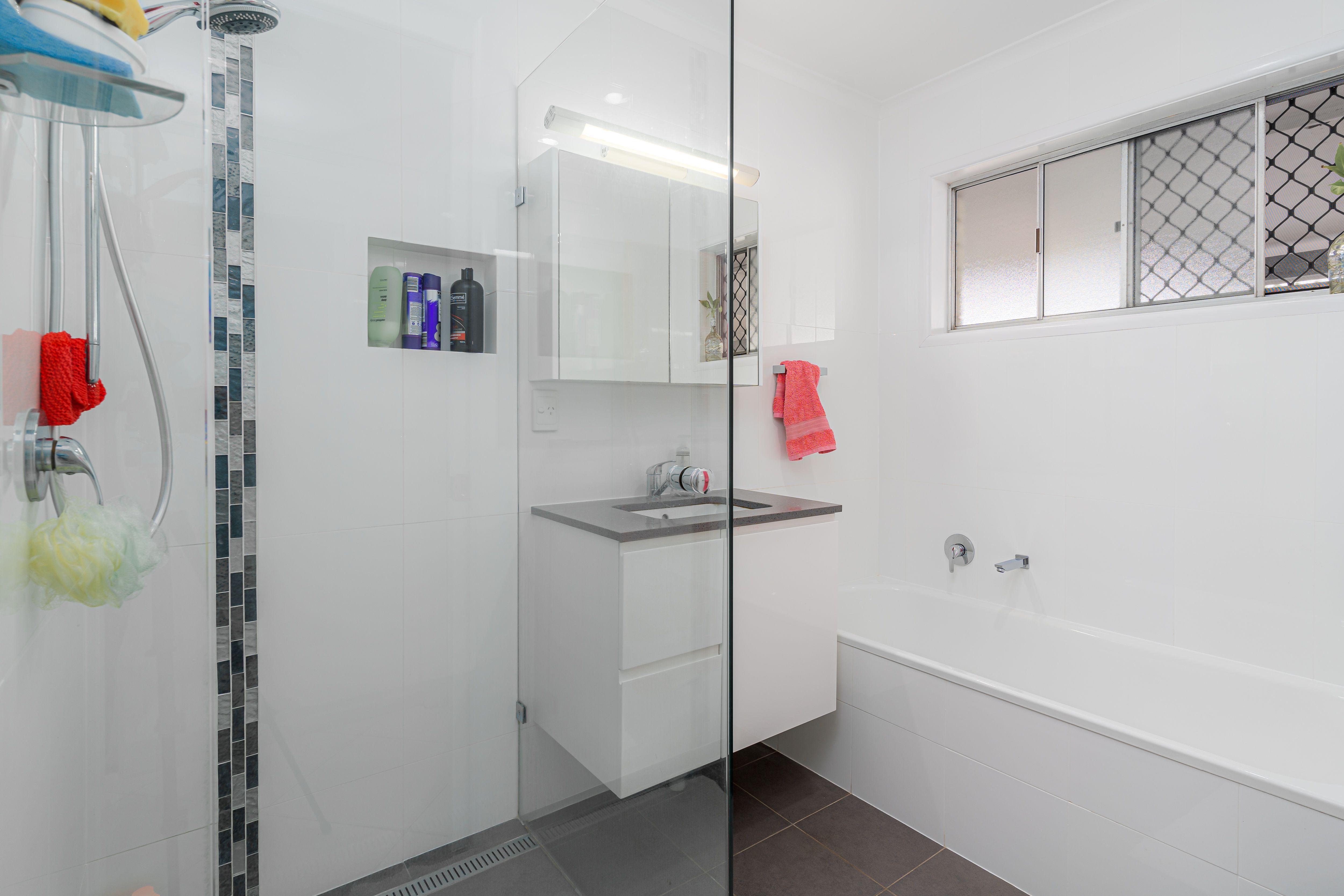 Beautiful Family Home with Multiple Living Areas and Sparkling Blue Pool!