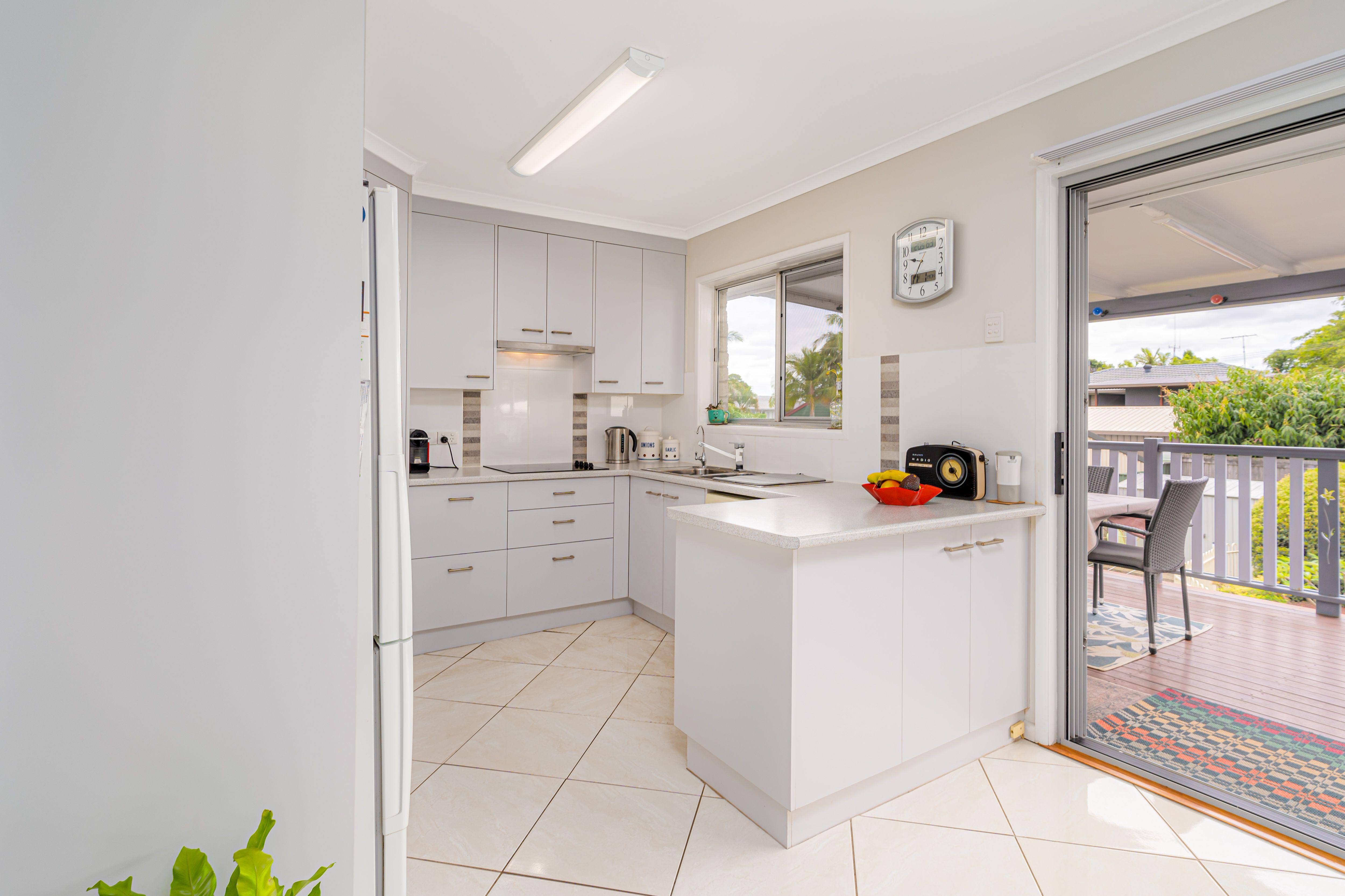 Beautiful Family Home with Multiple Living Areas and Sparkling Blue Pool!