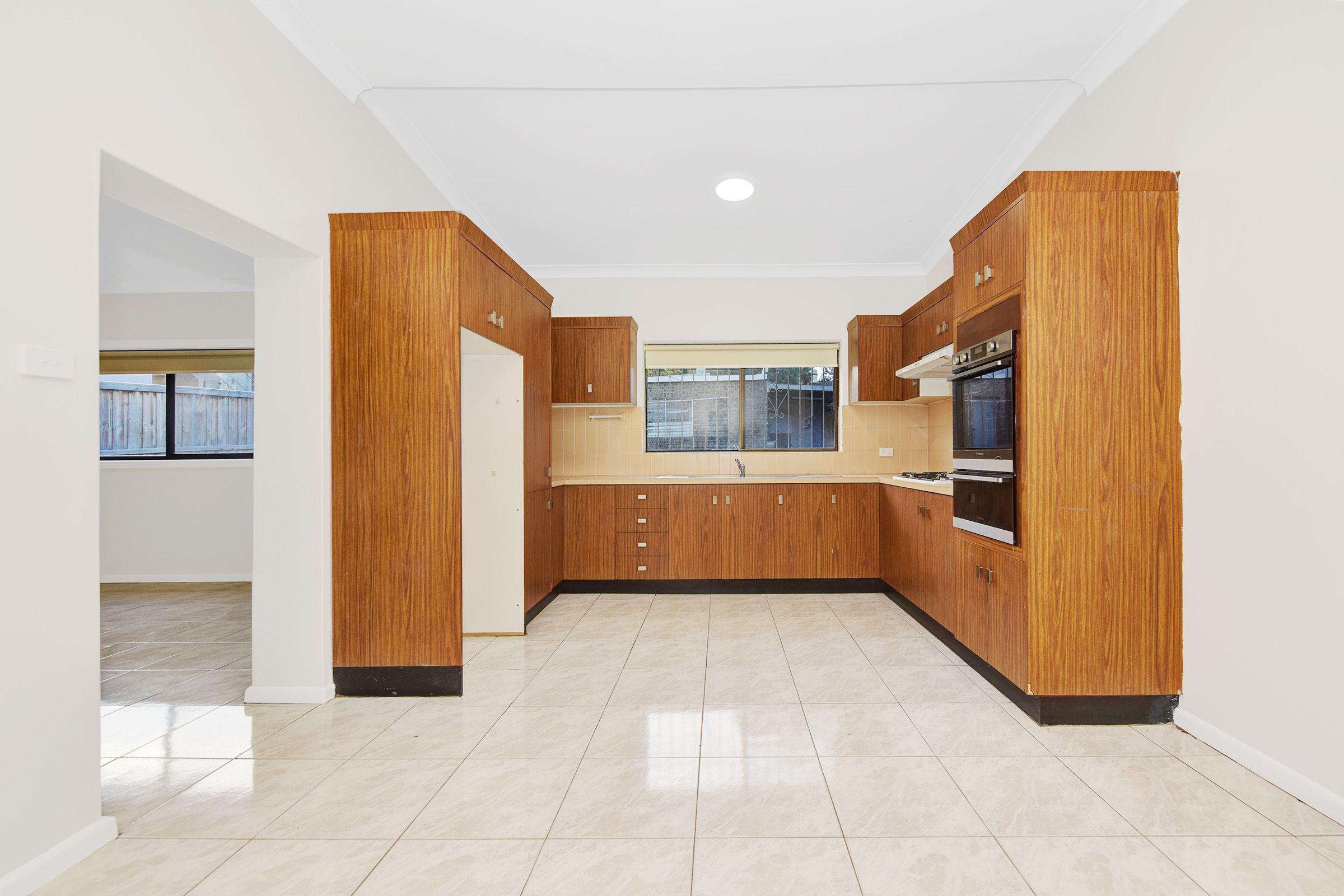 Spacious 3-4 Bedroom Home with Backyard