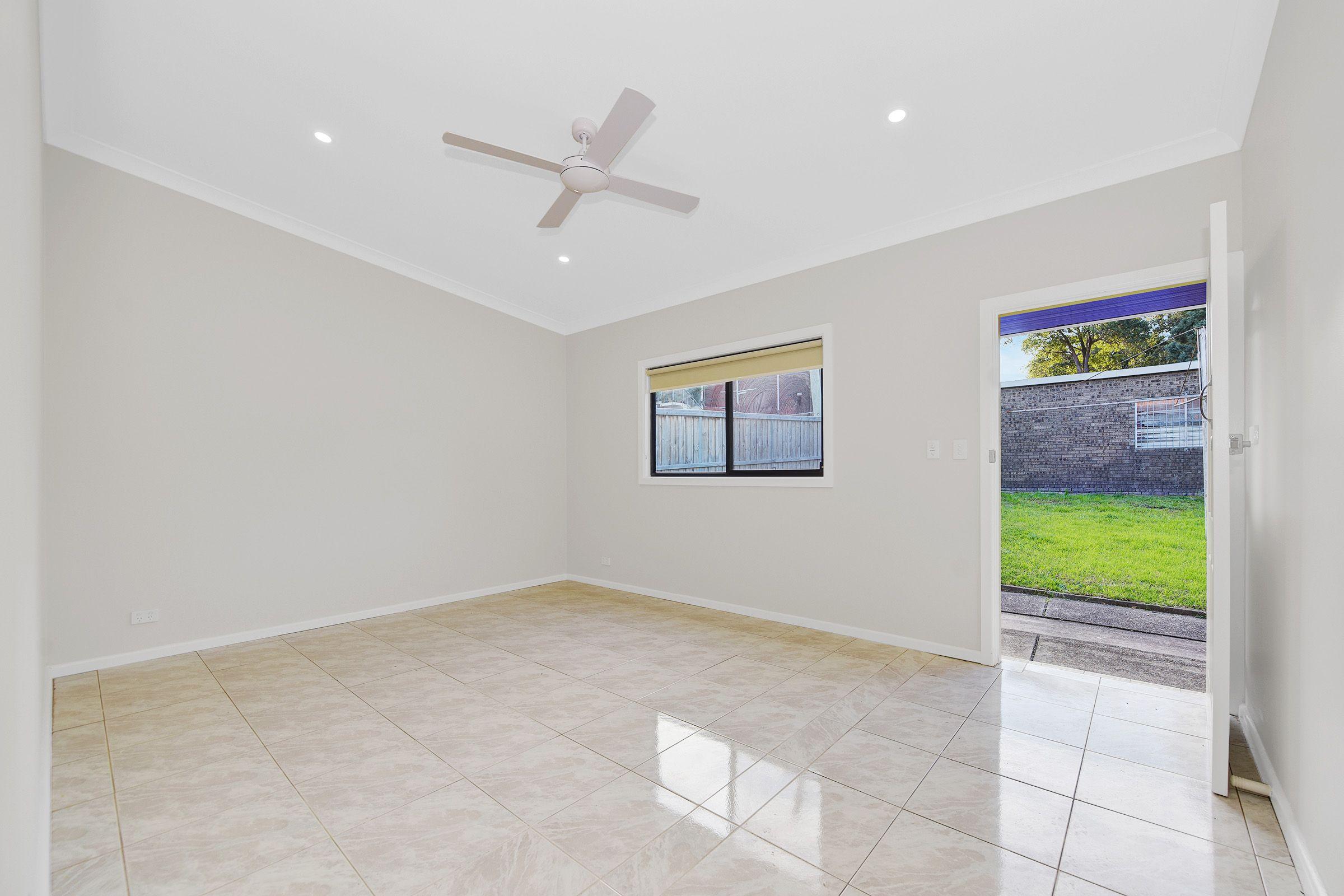 Spacious 3-4 Bedroom Home with Backyard