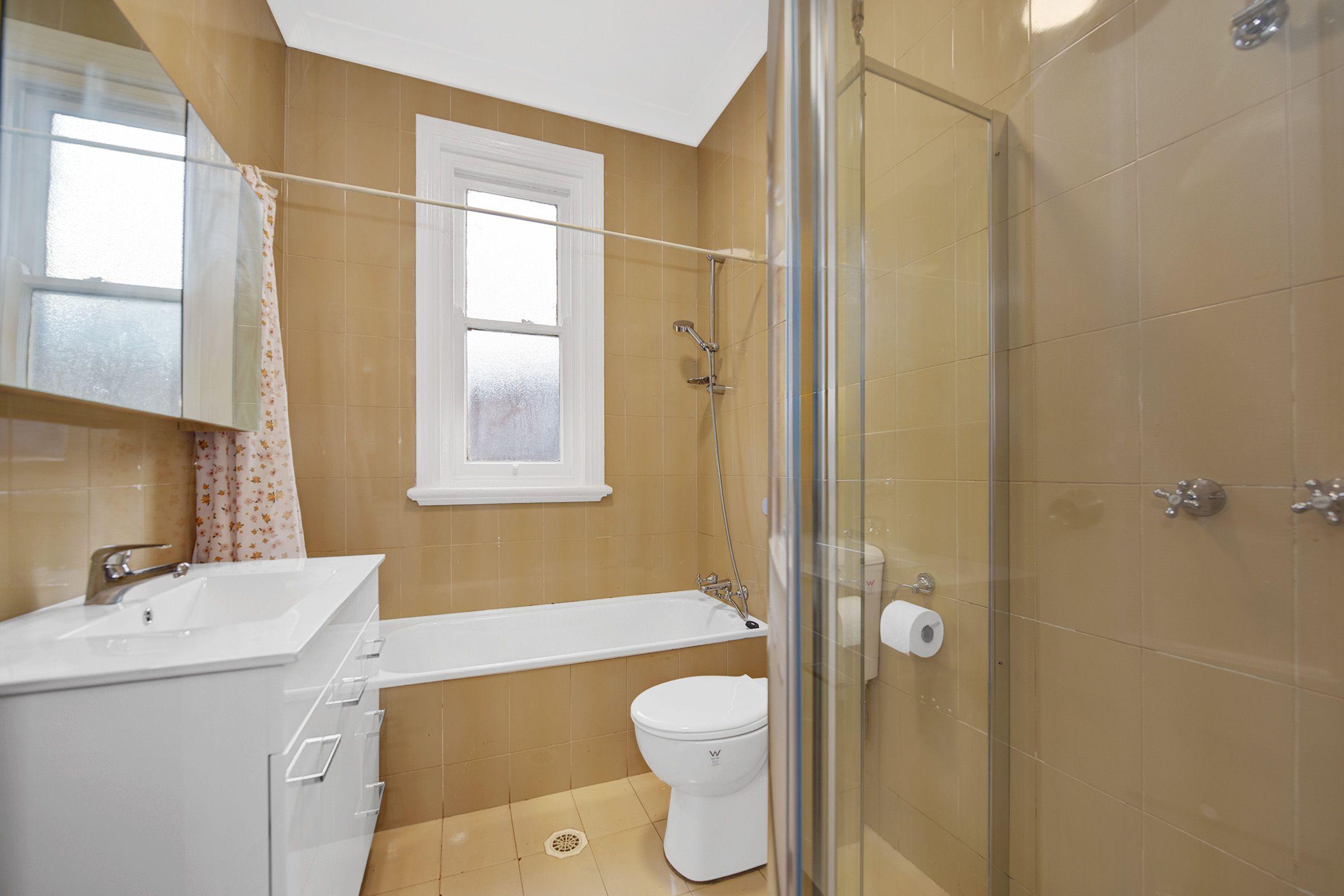 Spacious 3-4 Bedroom Home with Backyard