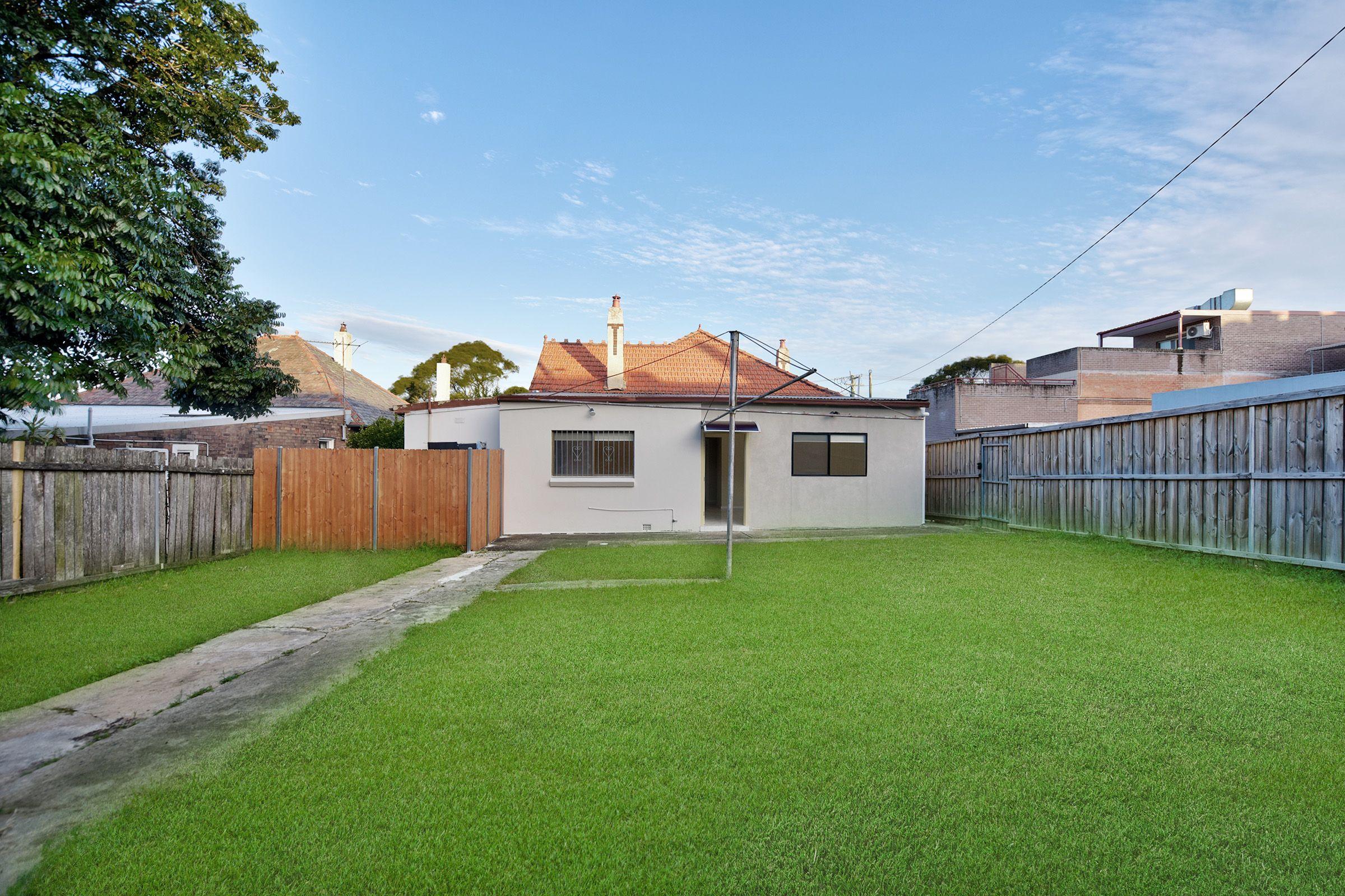 Spacious 3-4 Bedroom Home with Backyard