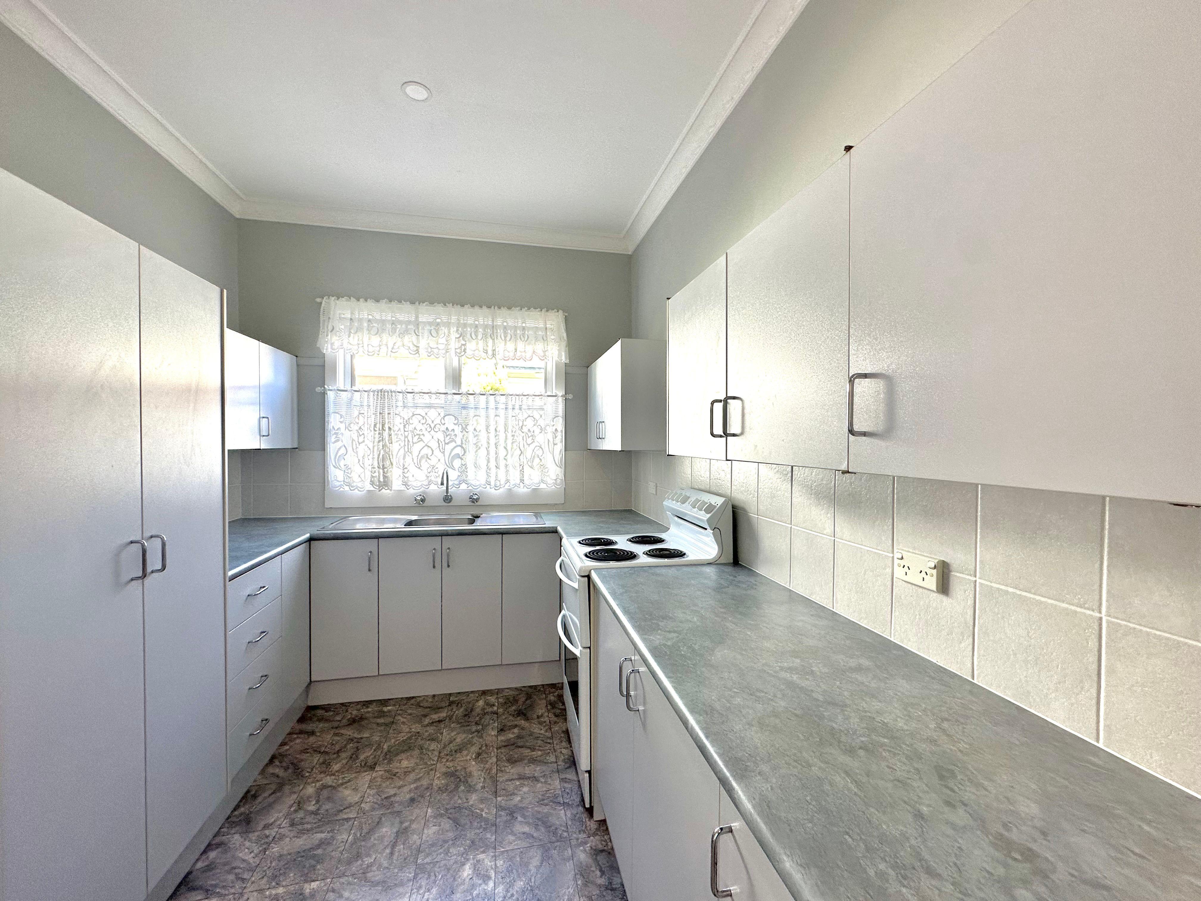 Tidy Three bedroom with Spacious yard!