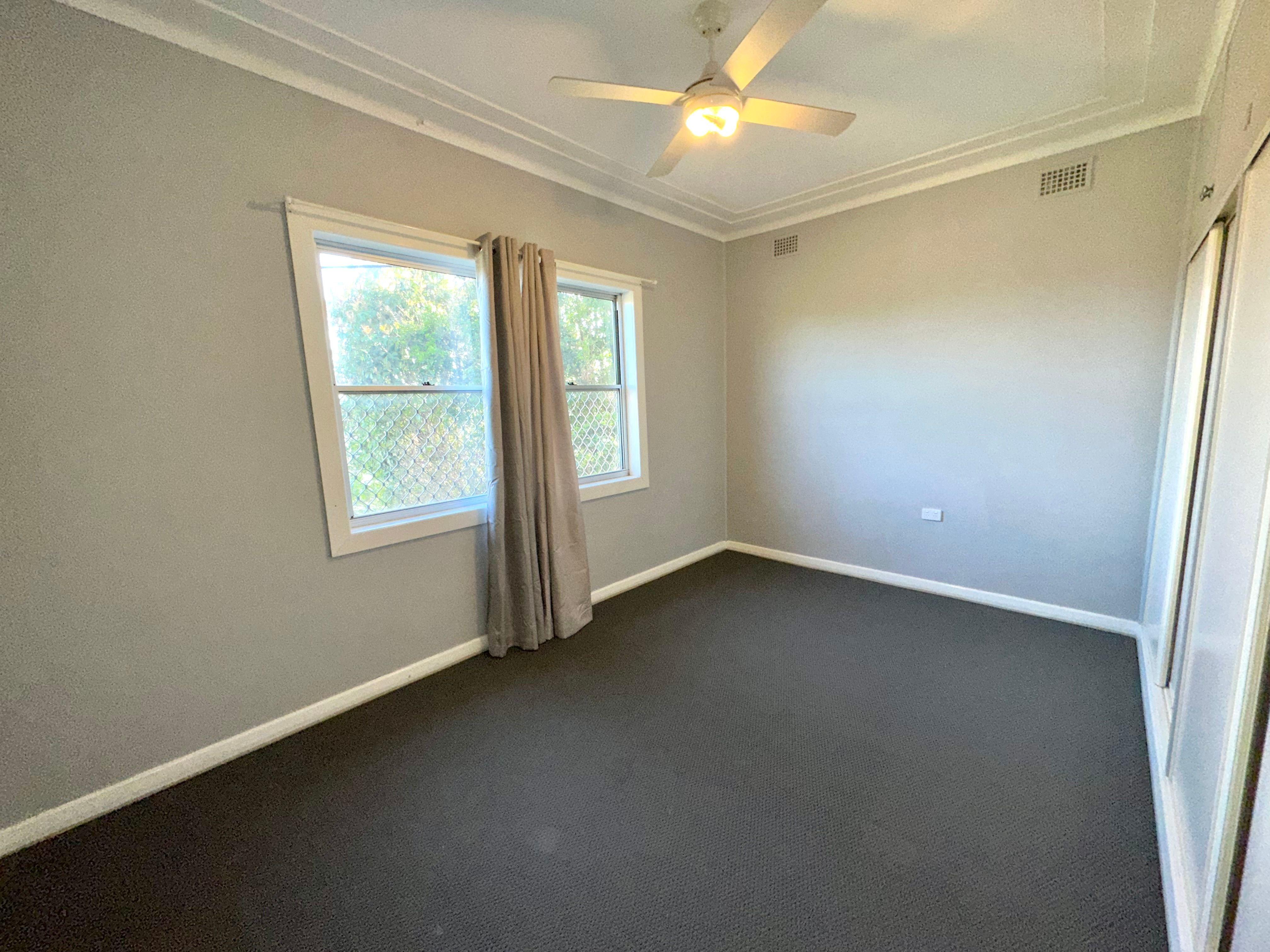 Tidy Three bedroom with Spacious yard!