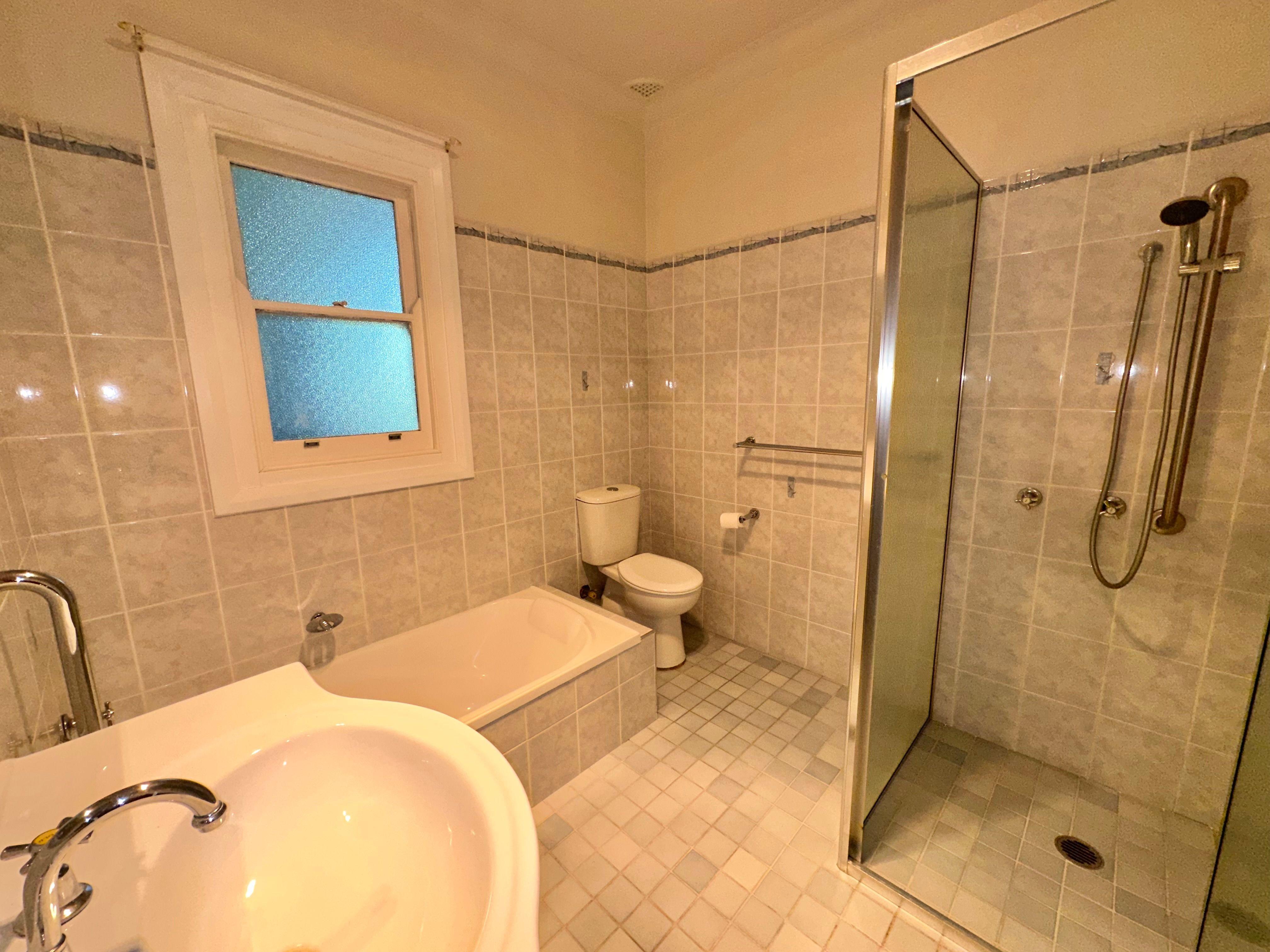 Tidy Three bedroom with Spacious yard!