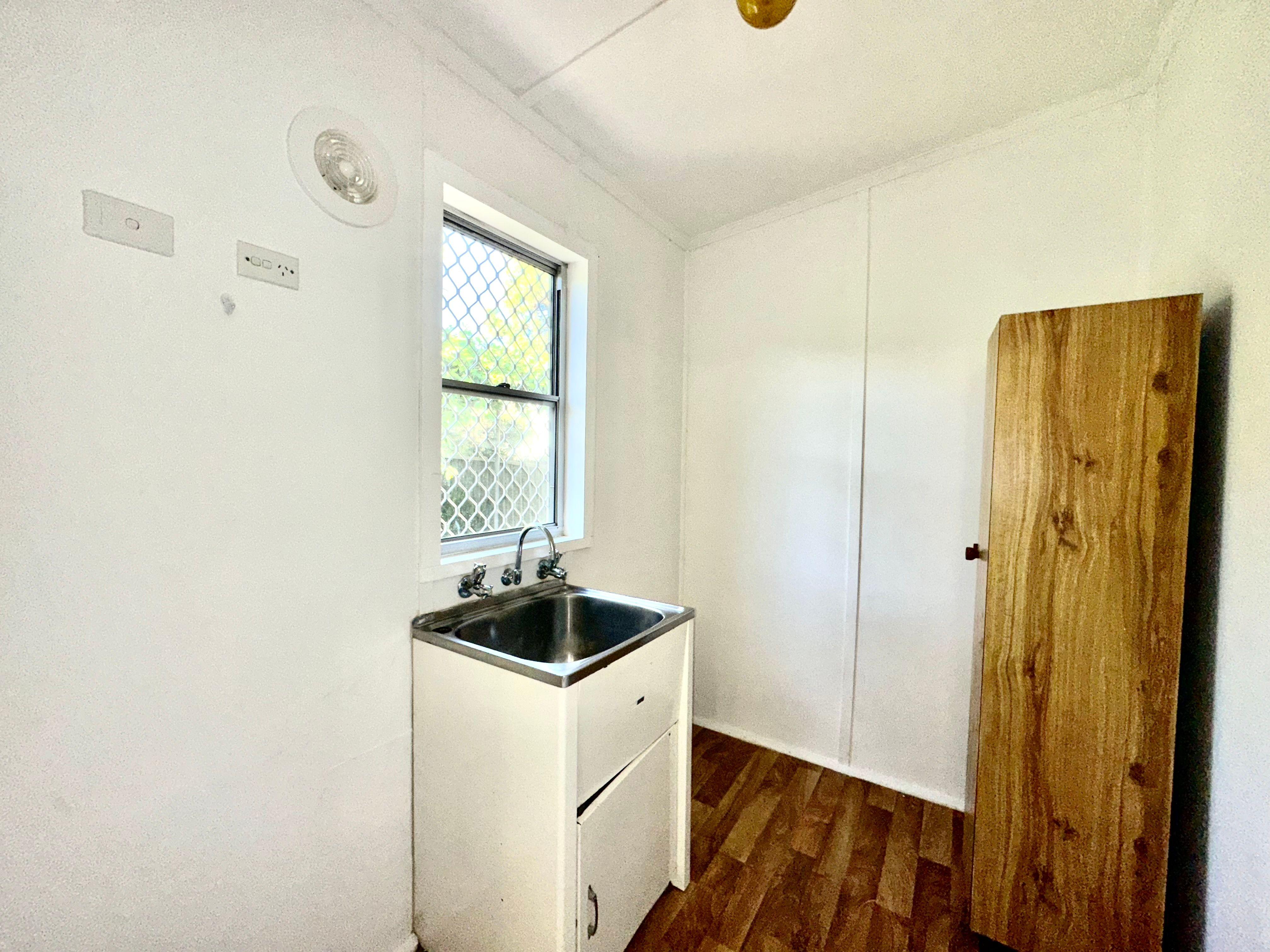 Tidy Three bedroom with Spacious yard!