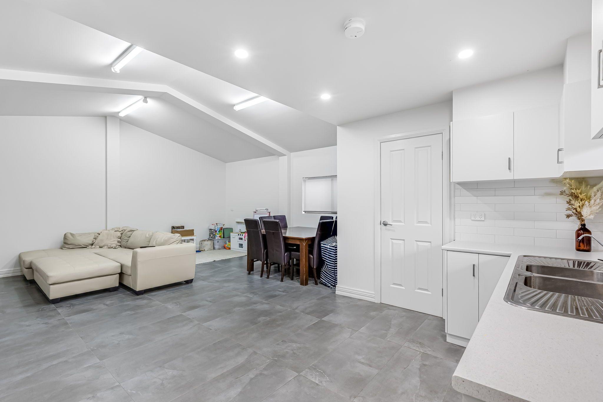 BEAUTIFULLY MAINTAINED FAMILY HOME WITH 3 BEDROOMS & GRANNY FLAT