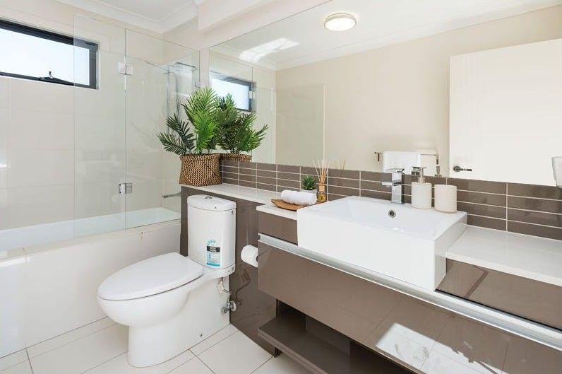 Modern 3-Bedroom Retreat in Annerley