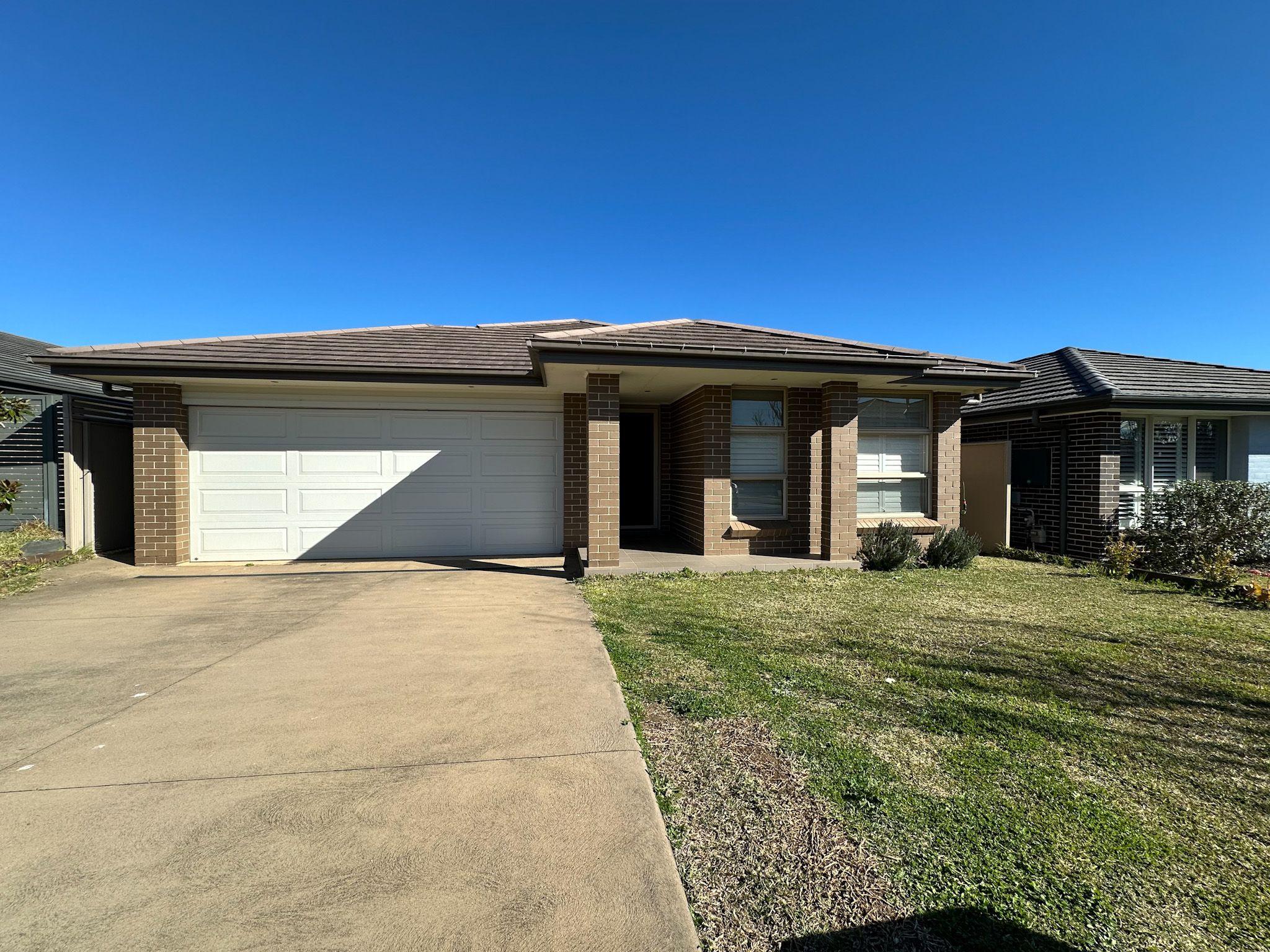 Prop-GPT: House: NSW Spring Farm, NSW 2570 Home For Rent