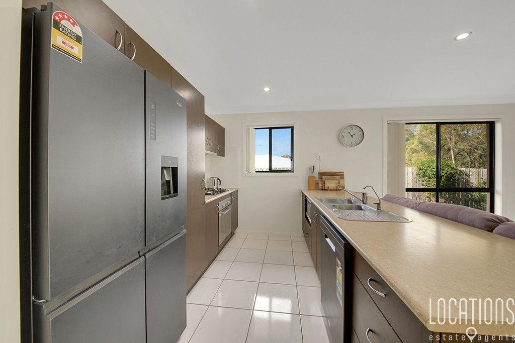 Spacious 4-Bedroom Home with Huge Shed in Glen Eden!