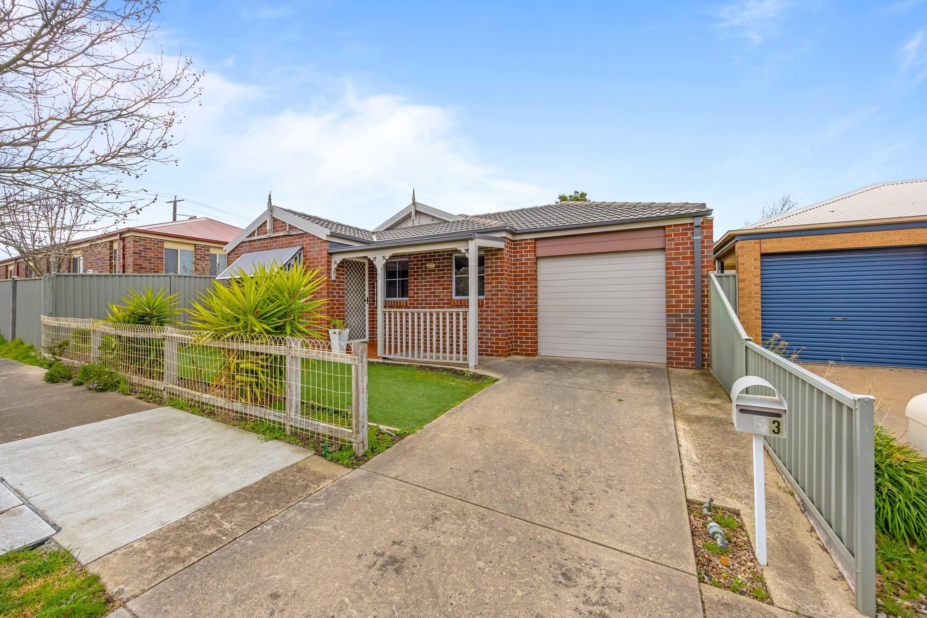 Spacious Family Home with Two Living Areas and Low-Maintenance Yard