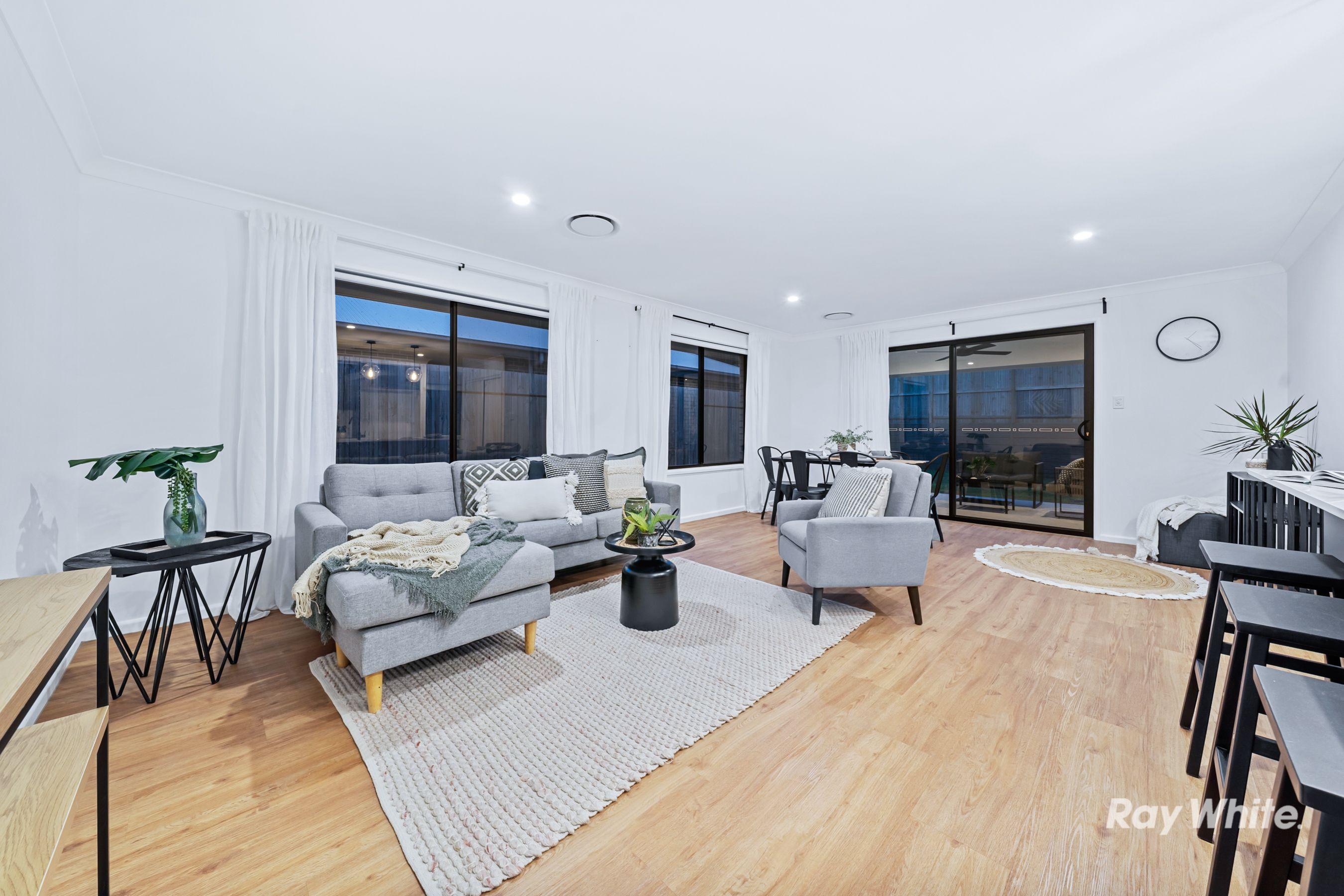 Contemporary Family Retreat with Multiple Living Zones & Solar Power