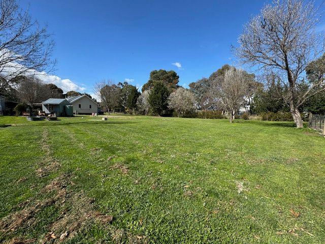 Country Charm in Peaceful Village Setting