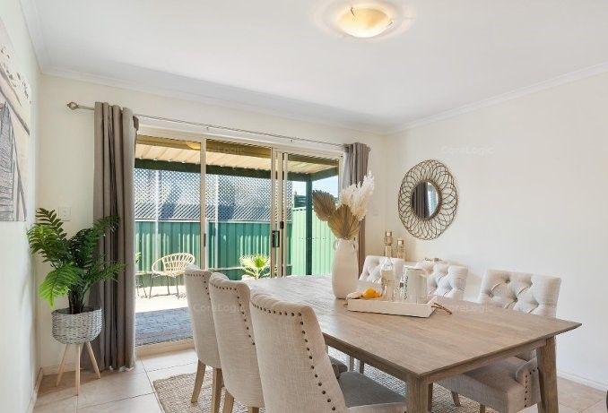 EASY CARE LIVING JUST A STROLL TO THE BEACH