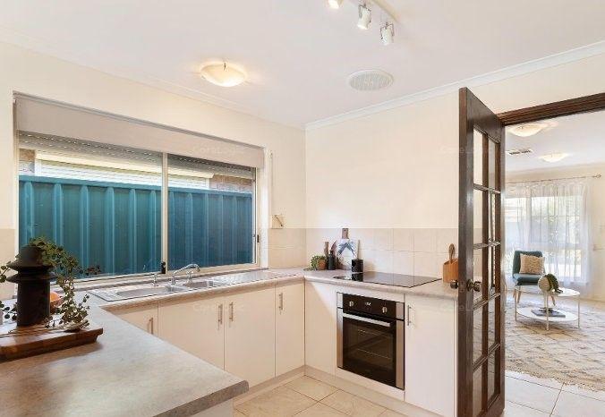 EASY CARE LIVING JUST A STROLL TO THE BEACH