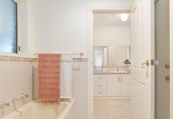 EASY CARE LIVING JUST A STROLL TO THE BEACH