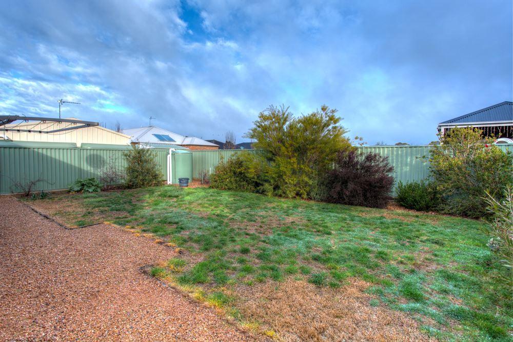 Beautifully Maintained Three-Bedroom Home With Entertaining Deck