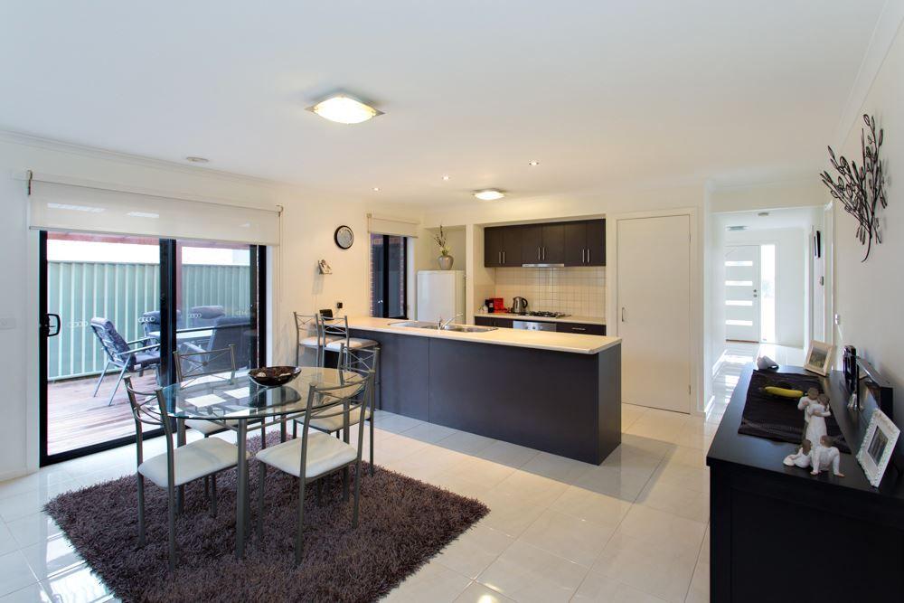 Beautifully Maintained Three-Bedroom Home With Entertaining Deck