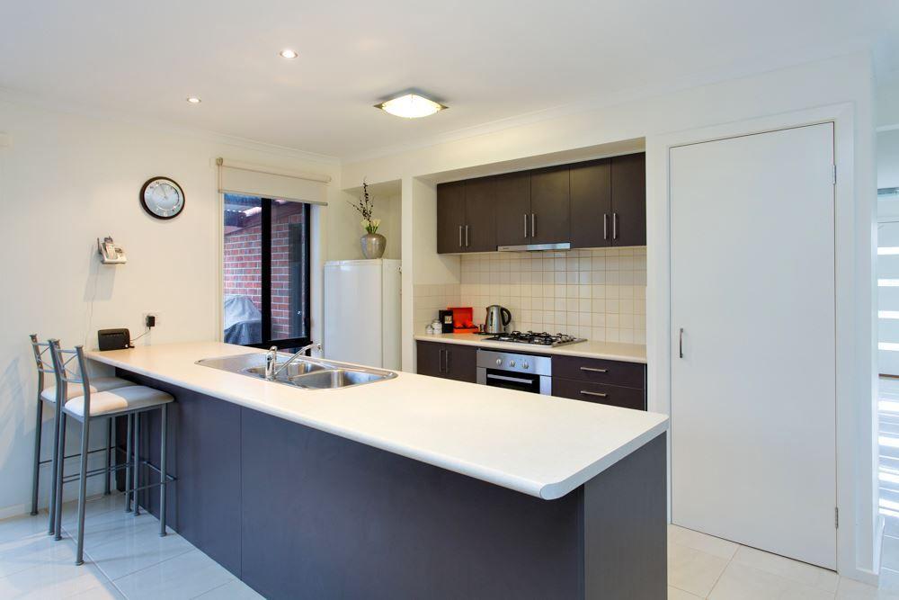 Beautifully Maintained Three-Bedroom Home With Entertaining Deck