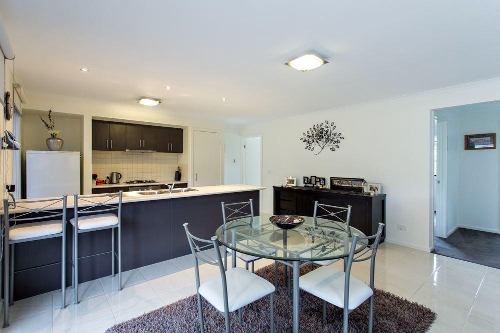 Beautifully Maintained Three-Bedroom Home With Entertaining Deck