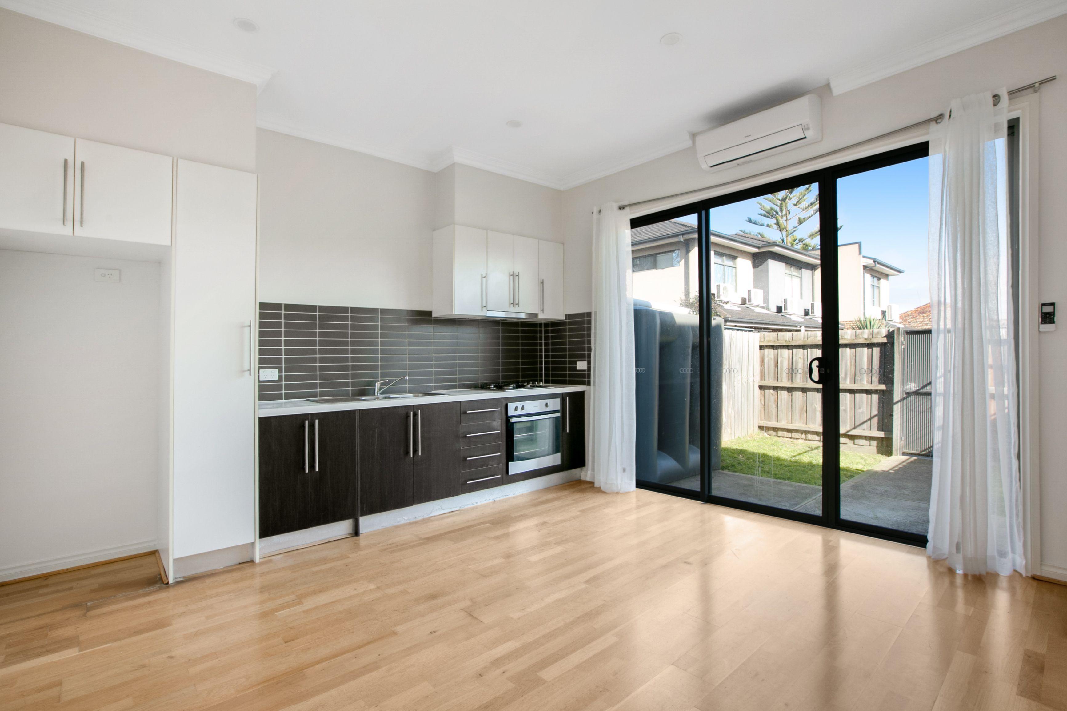 Spacious Light filled Townhouse in Terrific Location!